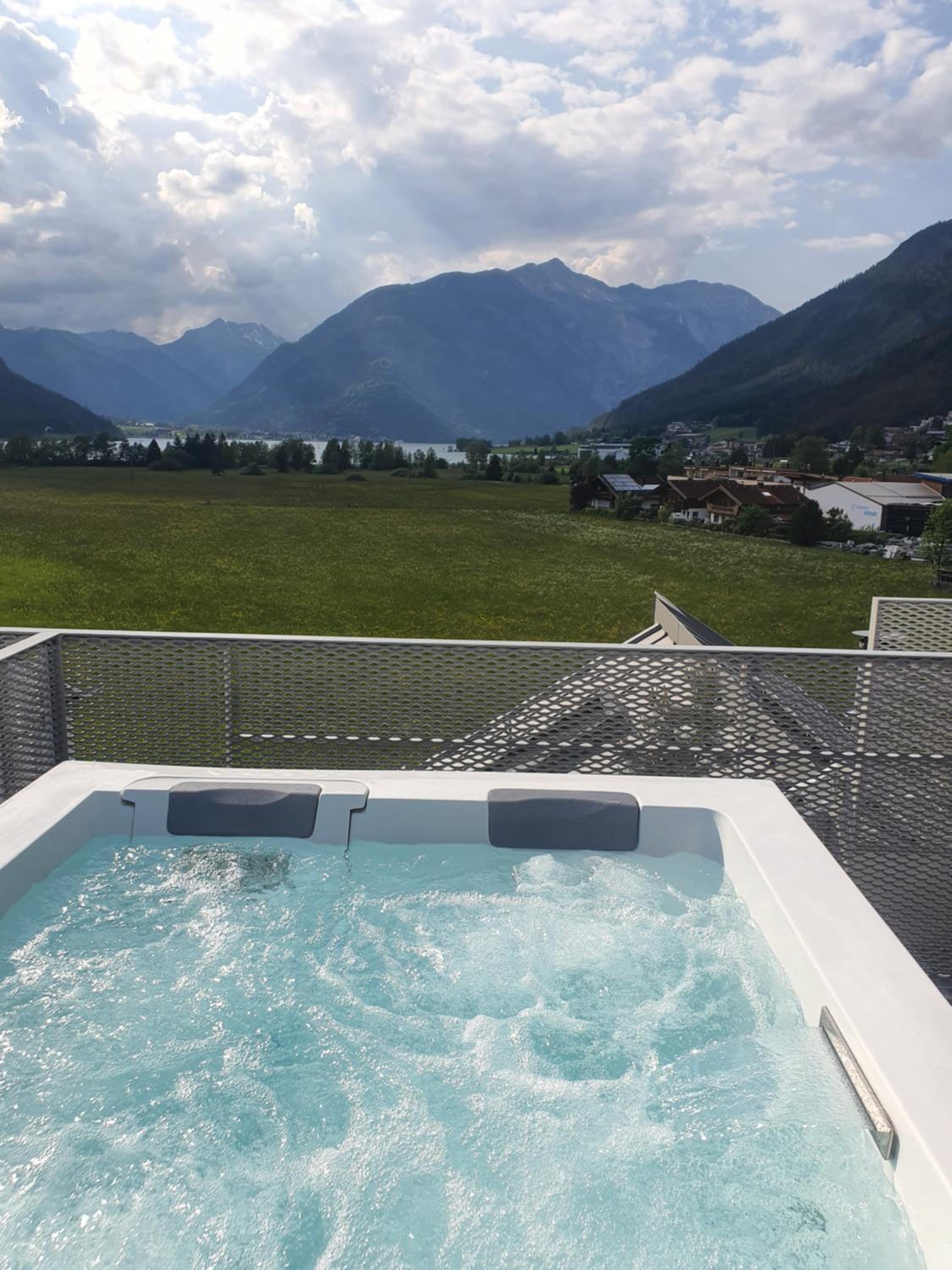 Modern Alpine Penthouse with Lake View
