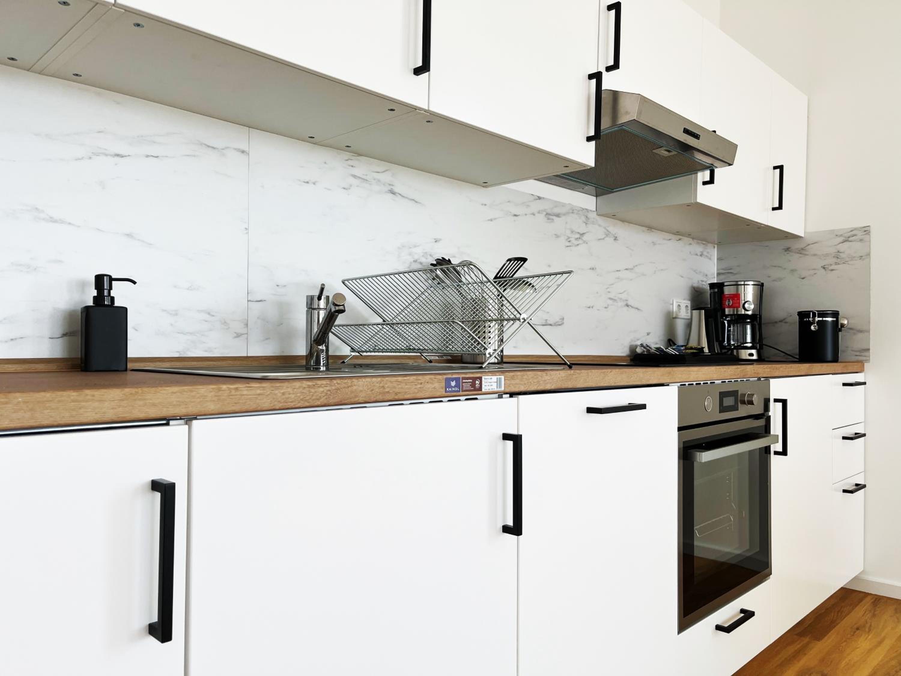 Moderne Apartments im Herzen der Stadt I private Tiefgarage mit Ladesäulen I home2share