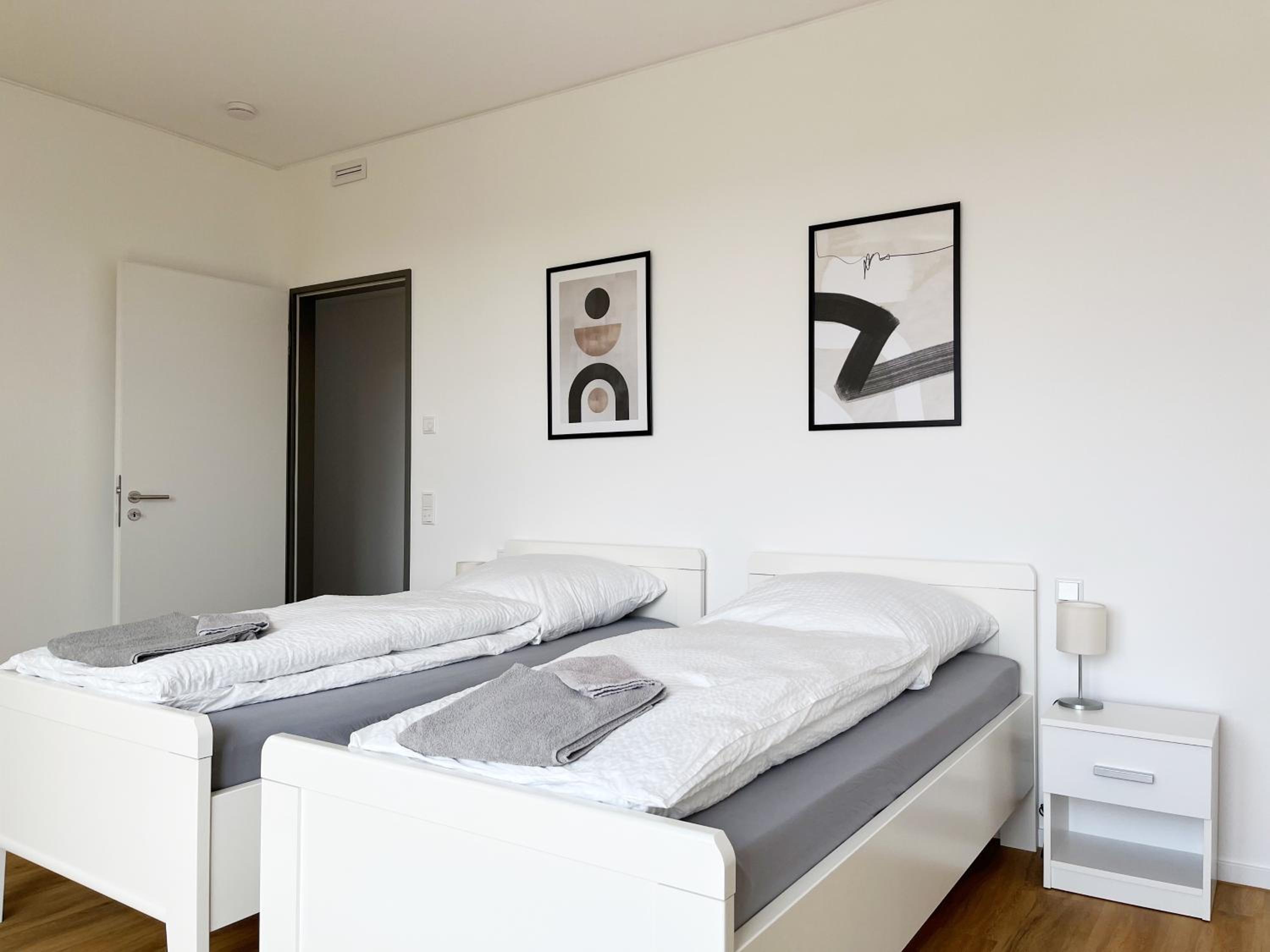 Moderne Apartments im Herzen der Stadt I private Tiefgarage mit Ladesäulen I home2share
