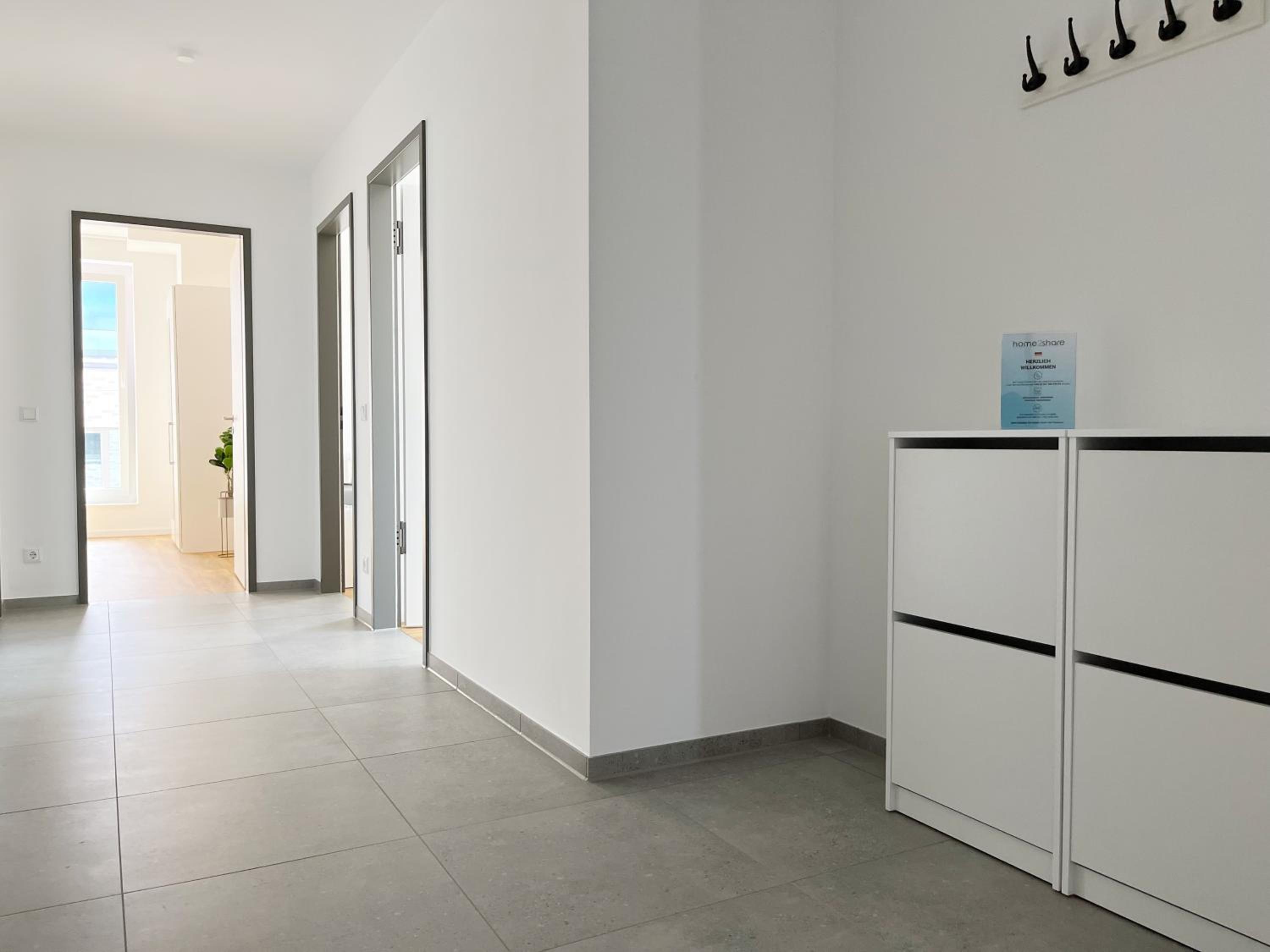 Moderne Apartments im Herzen der Stadt I private Tiefgarage mit Ladesäulen I home2share