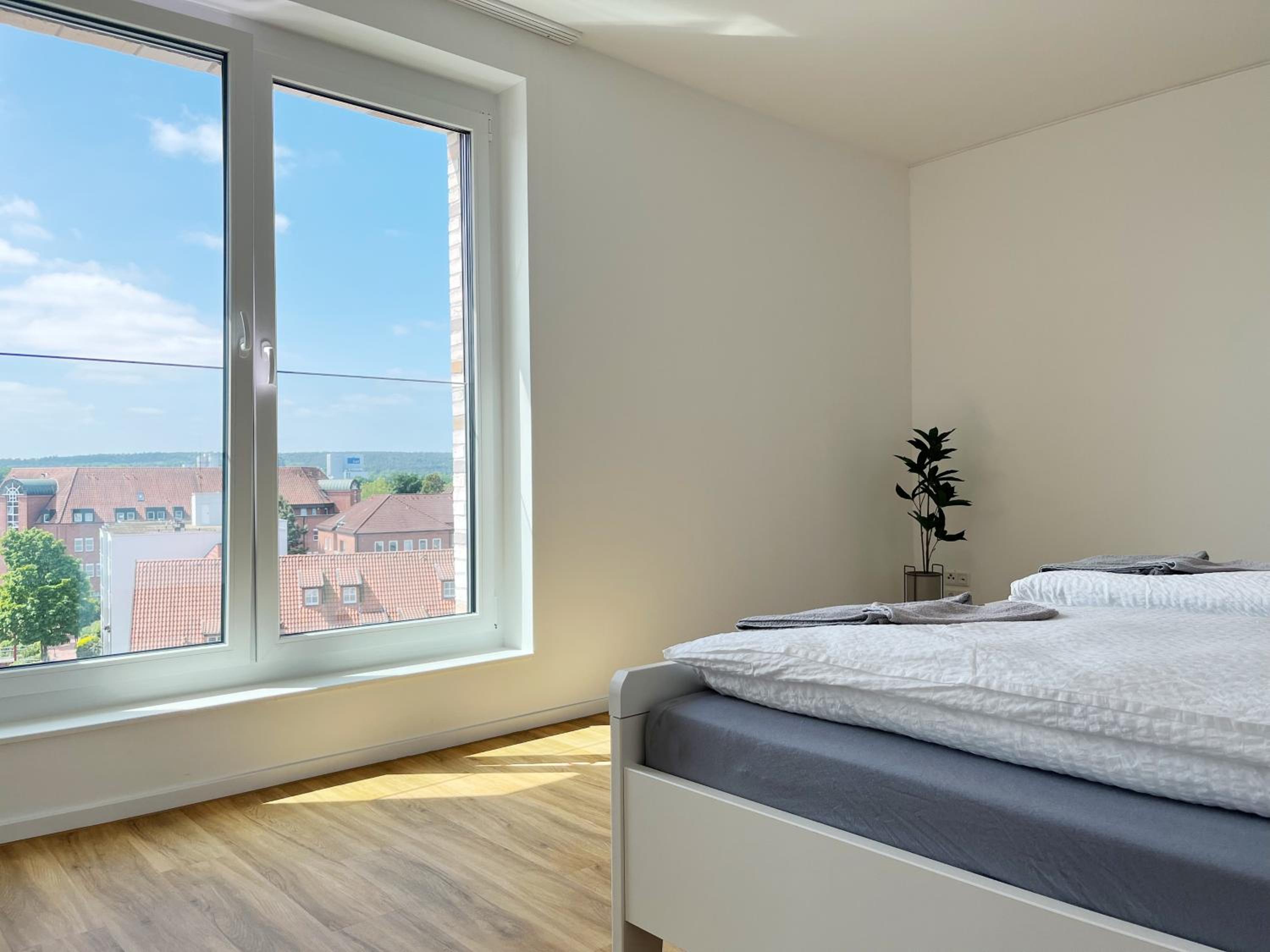 Moderne Apartments im Herzen der Stadt I private Tiefgarage mit Ladesäulen I home2share