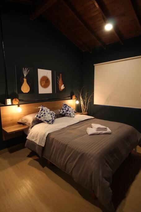 Apartamento cerca Unidad Deportiva Belén - ONE202 By Roots Rentals