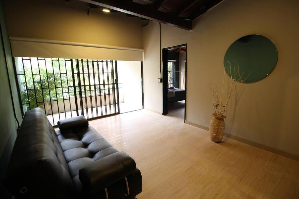 Apartamento cerca Unidad Deportiva Belén - ONE202 By Roots Rentals