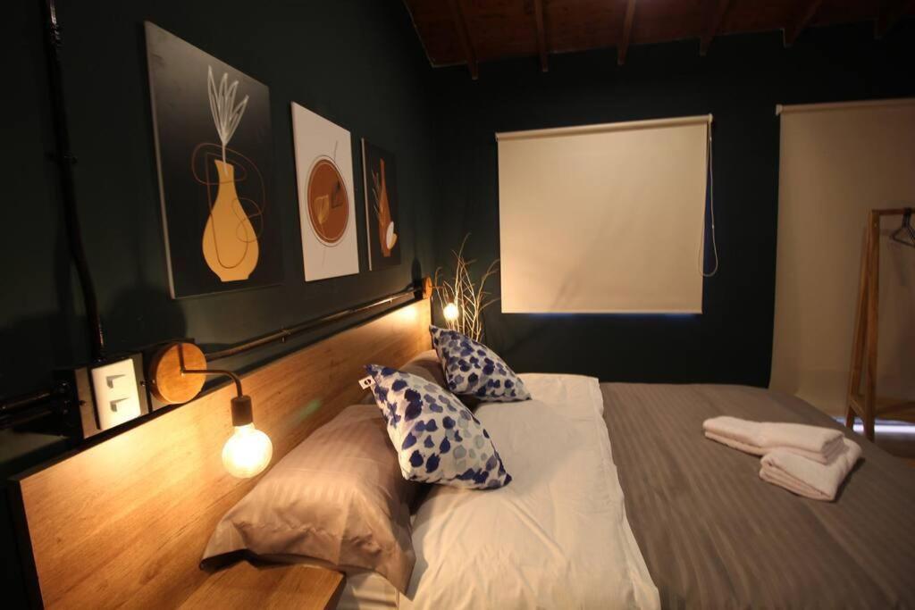 Apartamento cerca Unidad Deportiva Belén - ONE202 By Roots Rentals