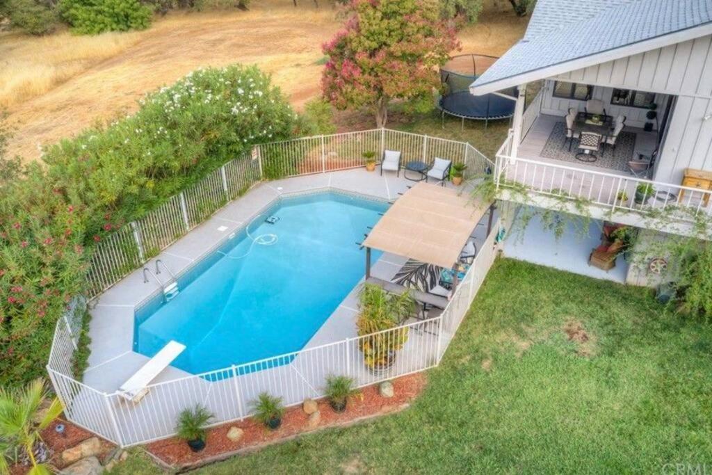 Spacious home with pool, bar, game room, parking, on 5 private acres. view 3
