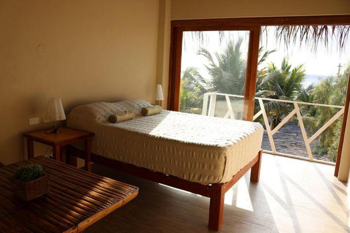 Marcilia Beach Bungalows view 4