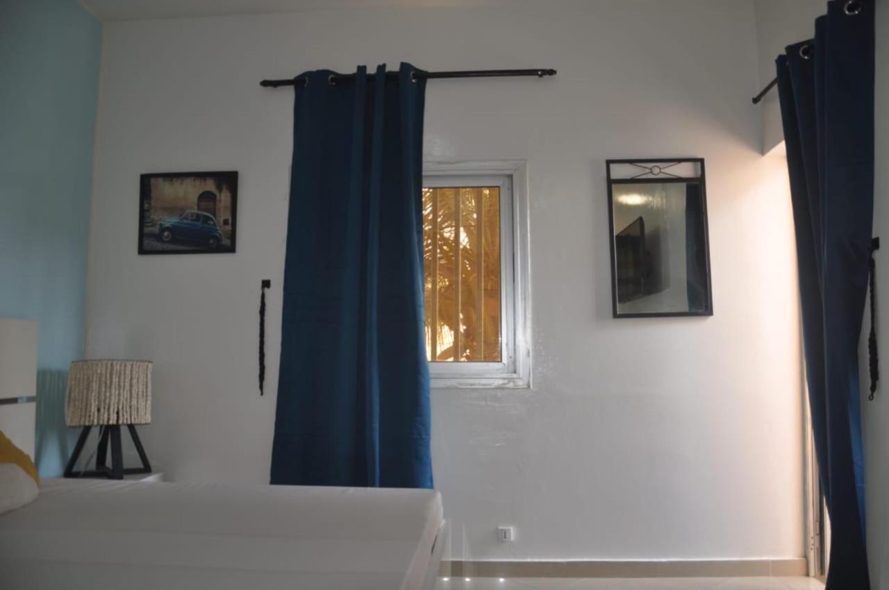 " Le Nid Douillet ", un fabuleux studio, calme, cosy et bien climatisé au centre de saly view 5