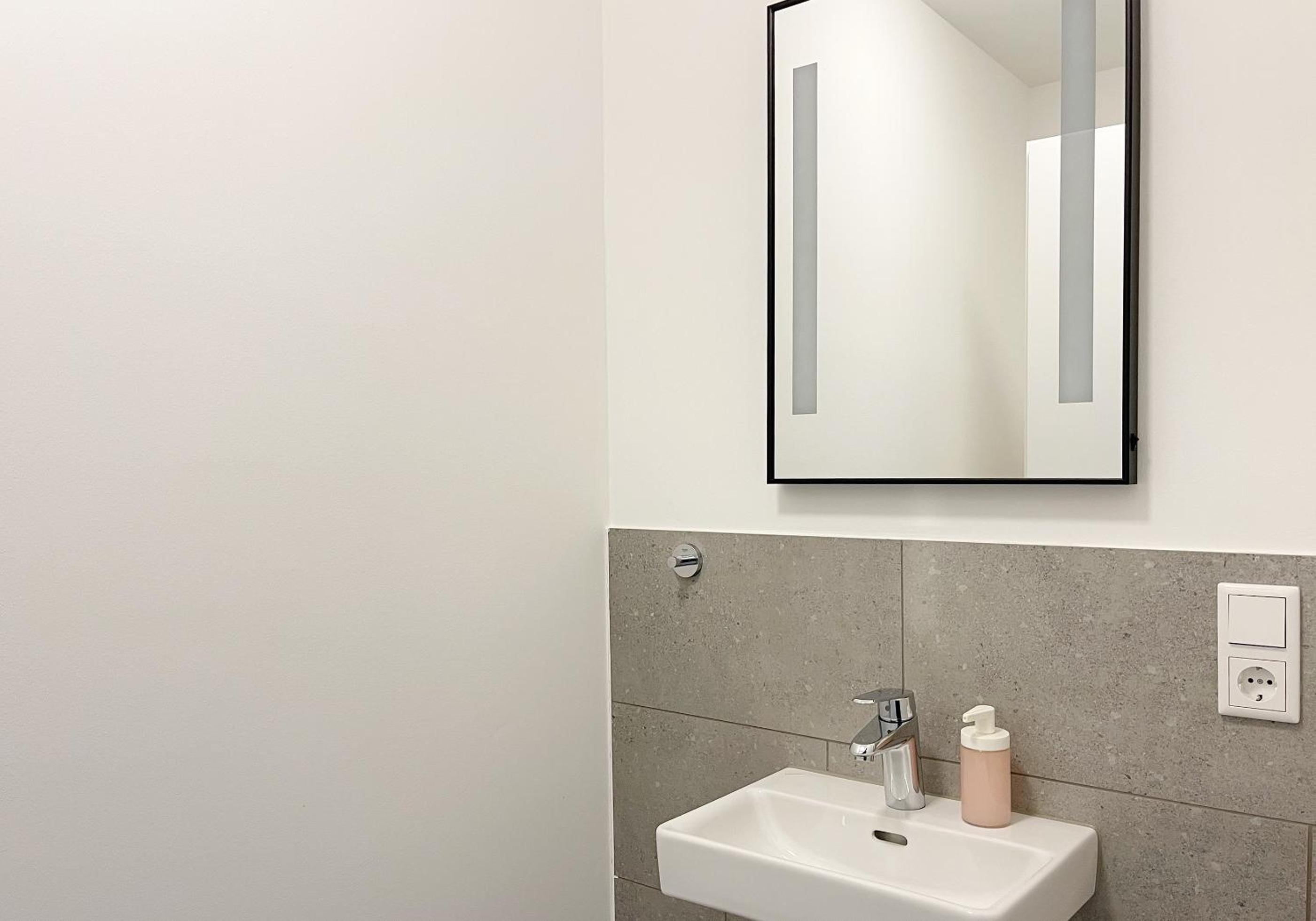 Moderne Apartments im Herzen der Stadt I private Tiefgarage mit Ladesäulen I home2share