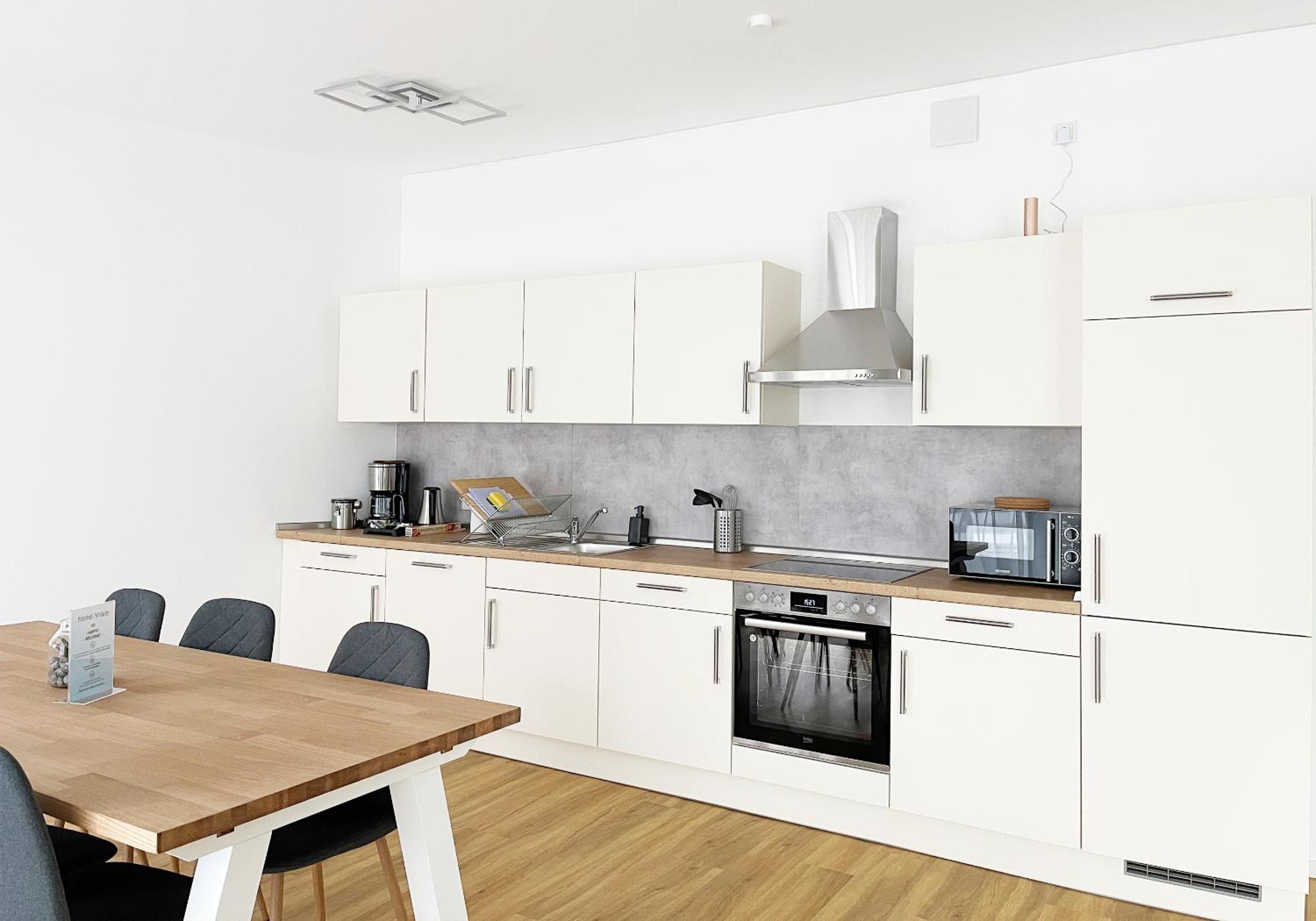 Moderne Apartments im Herzen der Stadt I private Tiefgarage mit Ladesäulen I home2share