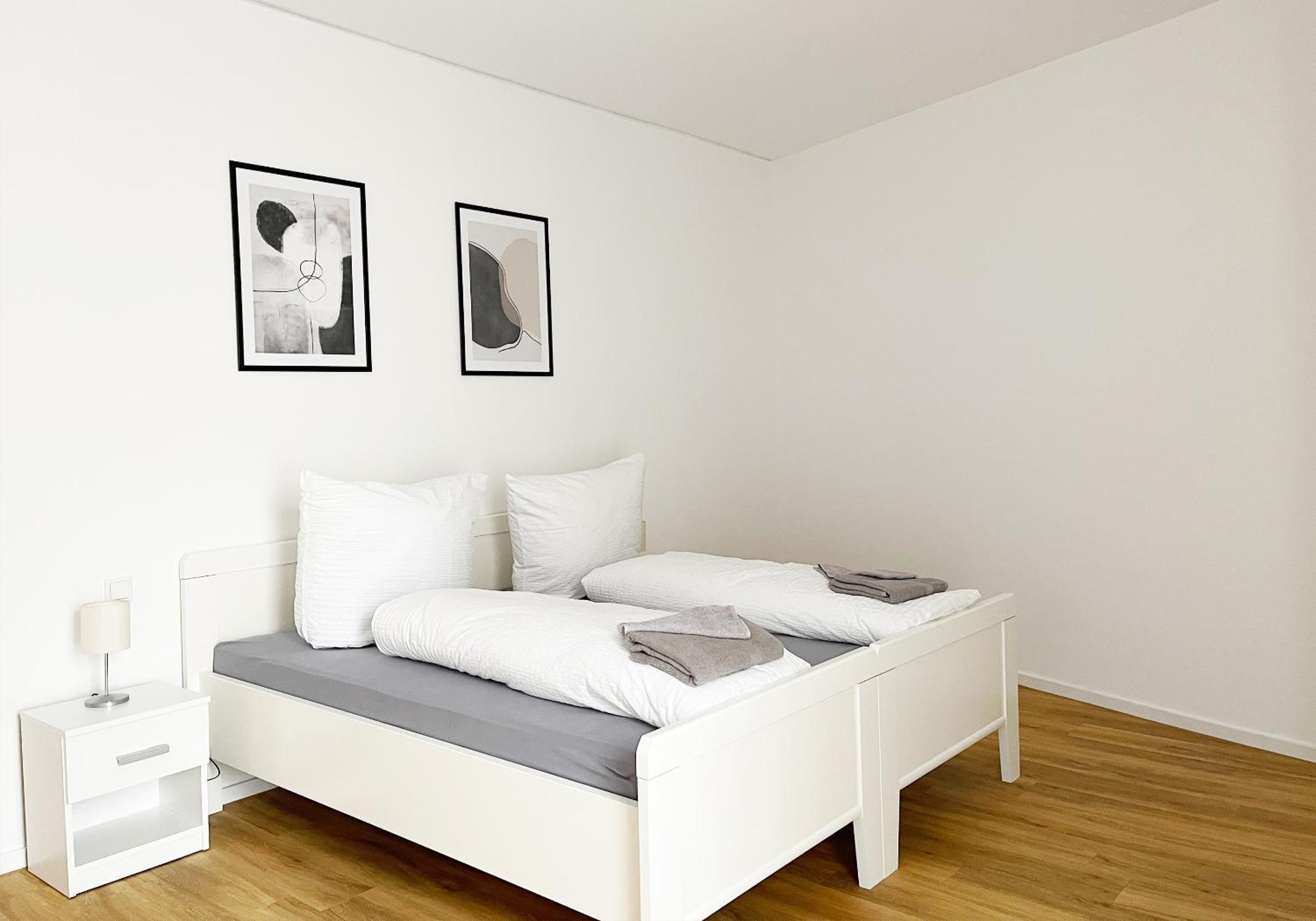 Moderne Apartments im Herzen der Stadt I private Tiefgarage mit Ladesäulen I home2share