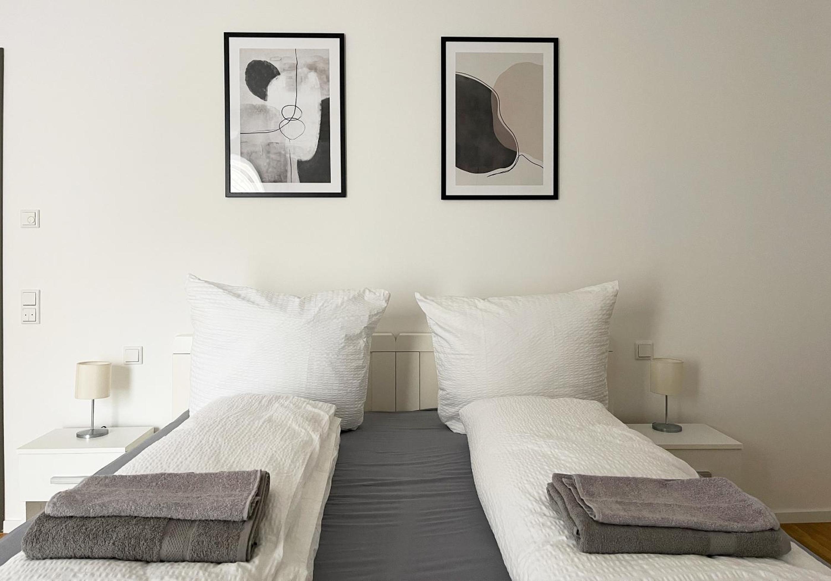 Moderne Apartments im Herzen der Stadt I private Tiefgarage mit Ladesäulen I home2share