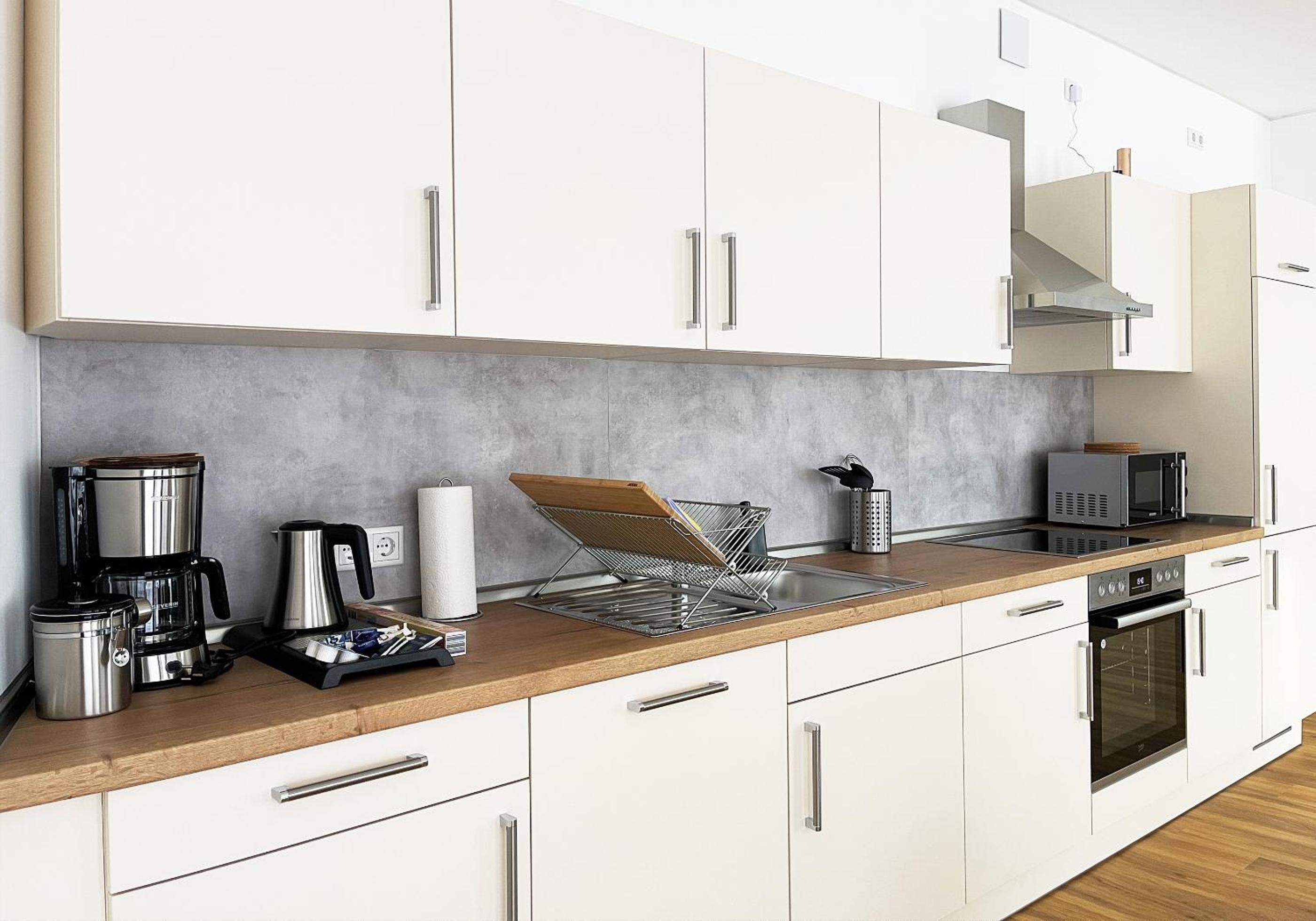 Moderne Apartments im Herzen der Stadt I private Tiefgarage mit Ladesäulen I home2share