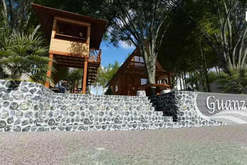 Beach Front Cabin with Treehouse view 3