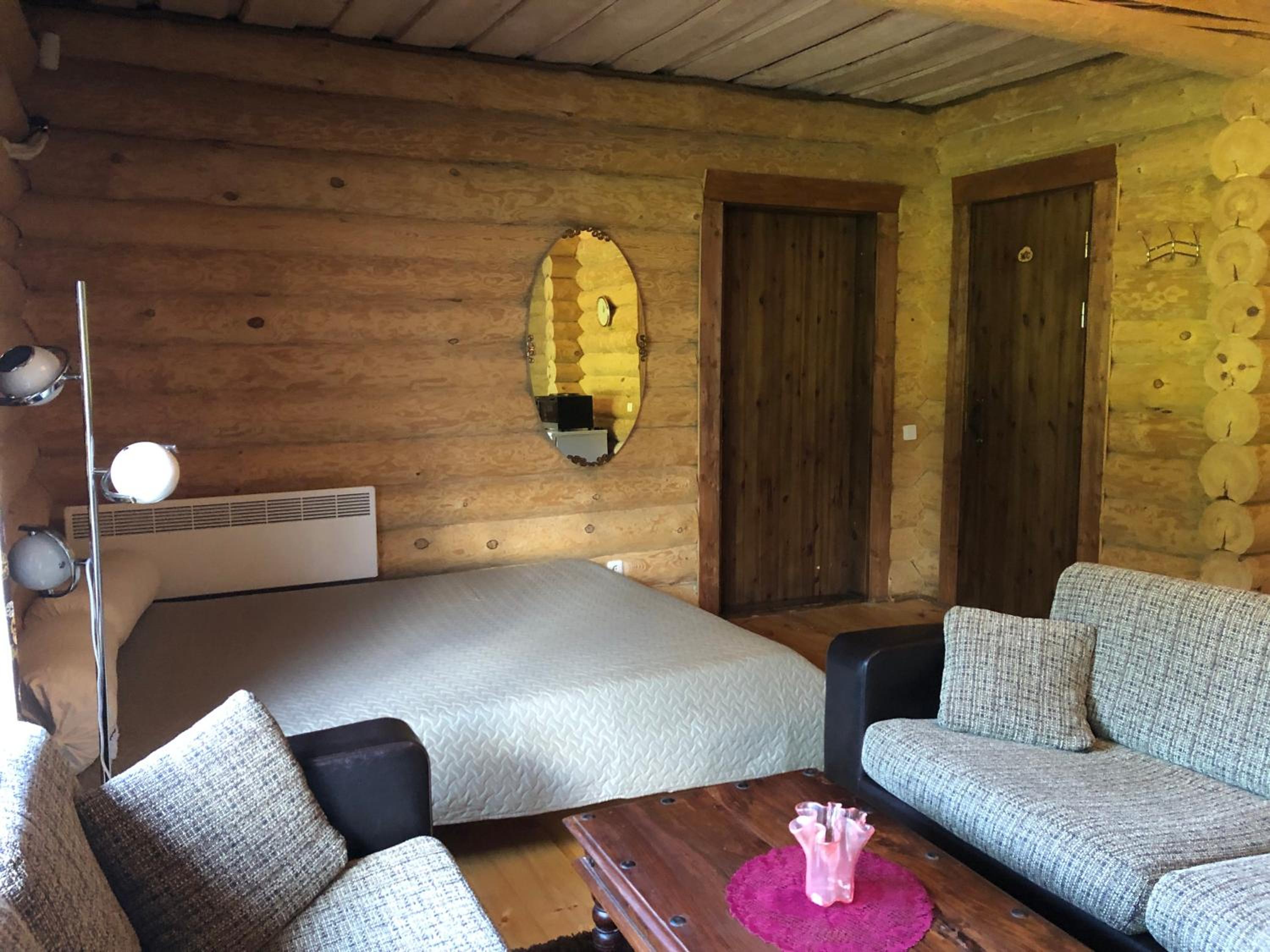 Part of house, sauna and terrace view 2