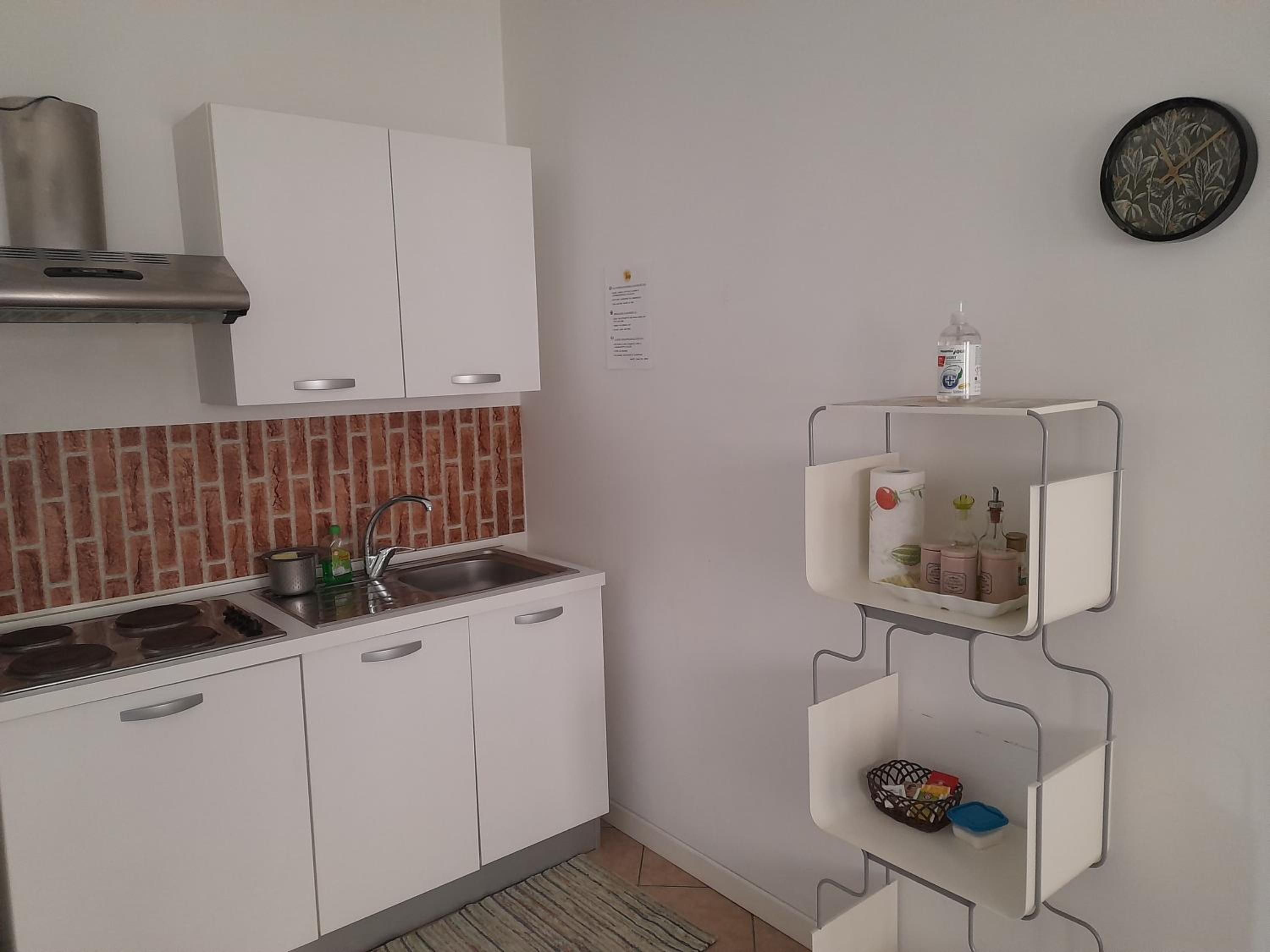 A Casa di Sole en Arese — kitchen