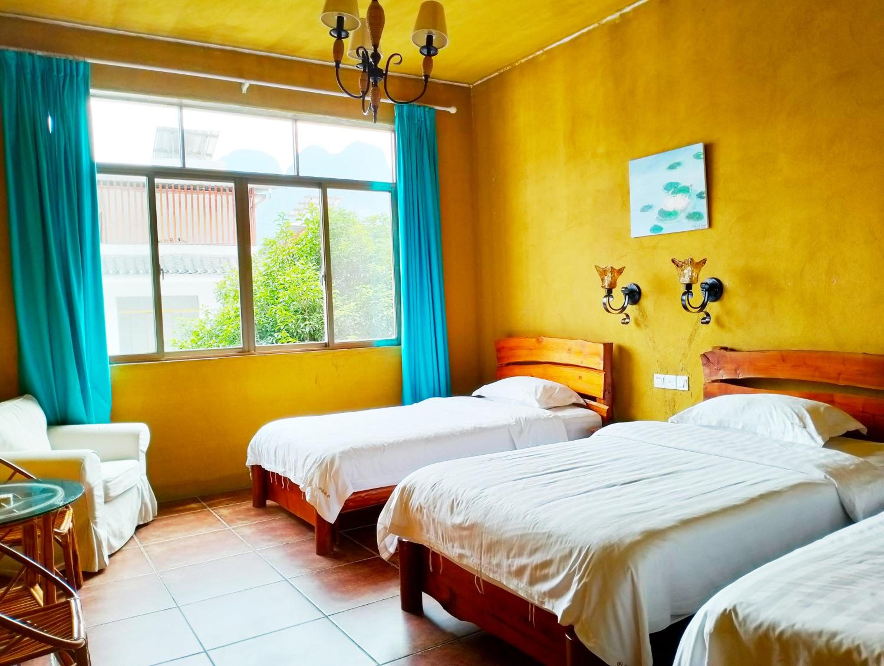 Yangshuo Eden's Social Guesthouse - Wake up to a hearty Western breakfast & fresh craft coffee & night beers & outdoor activities