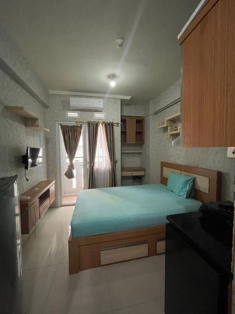 Green pramuka city by Panda Room