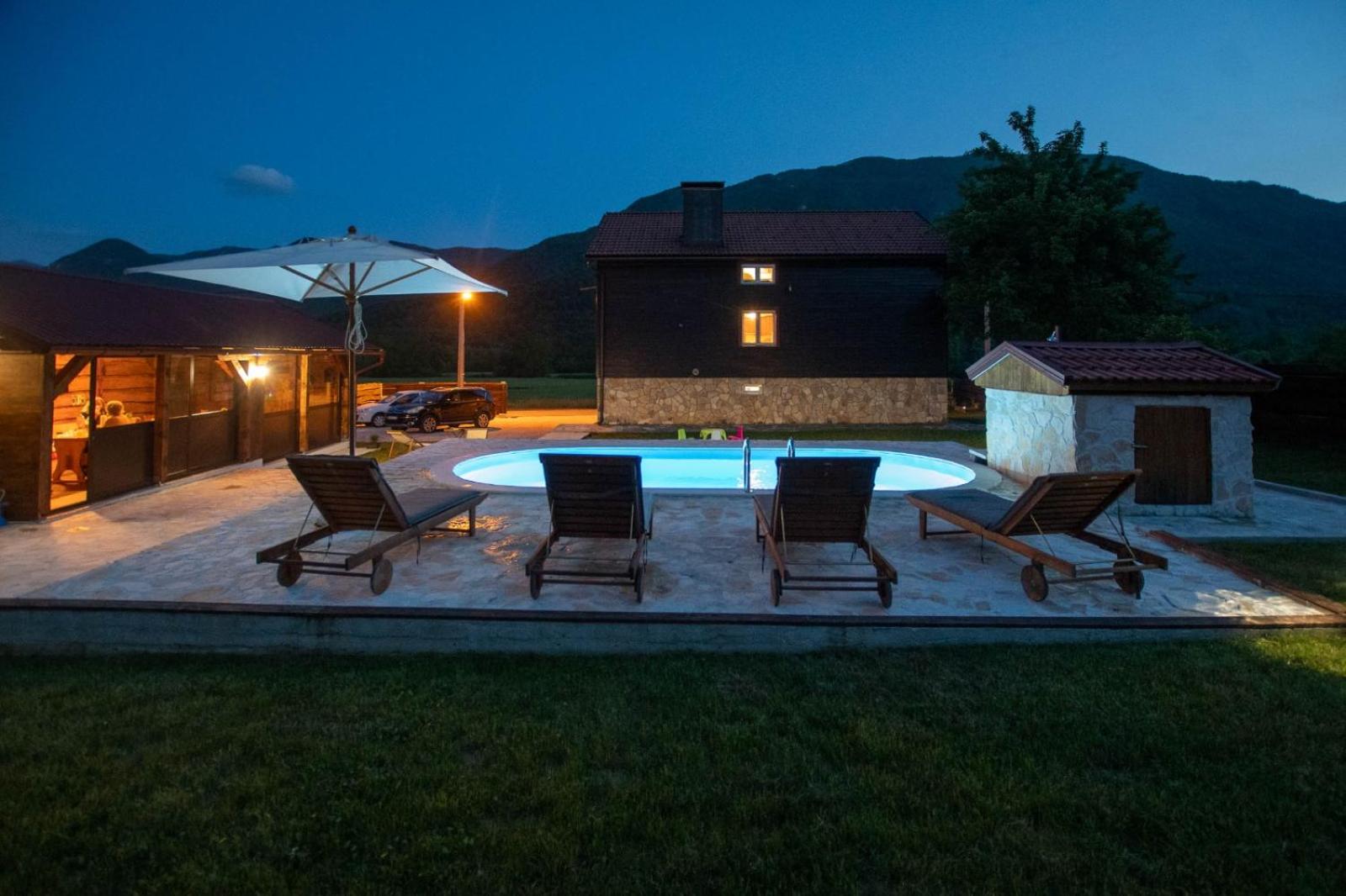 Nina Holiday Home with a heated pool view 4