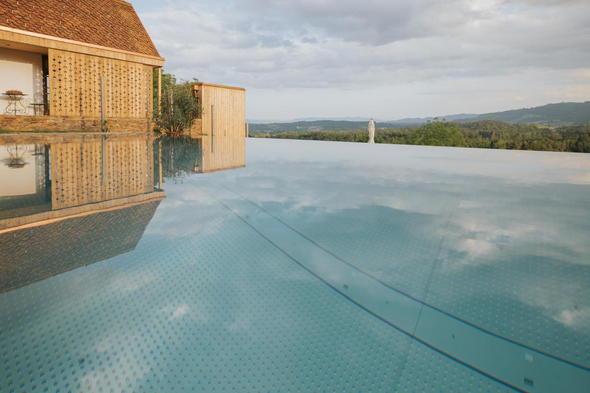Am Wildbachberg - Luxus Ferienhäuser mit Infinitypool, Privatsauna und Weinkeller