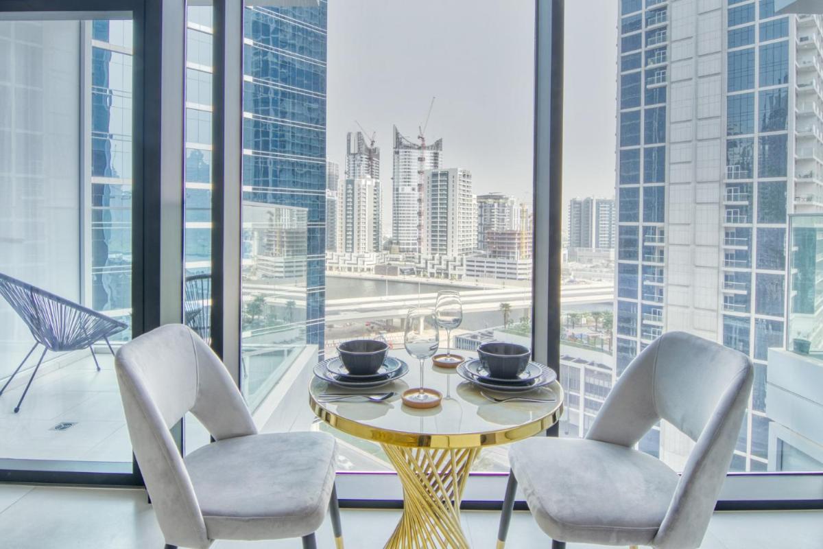 Luxury Studios with Burj Khalifa & Canal View in Downtown - Marquise Square Tower