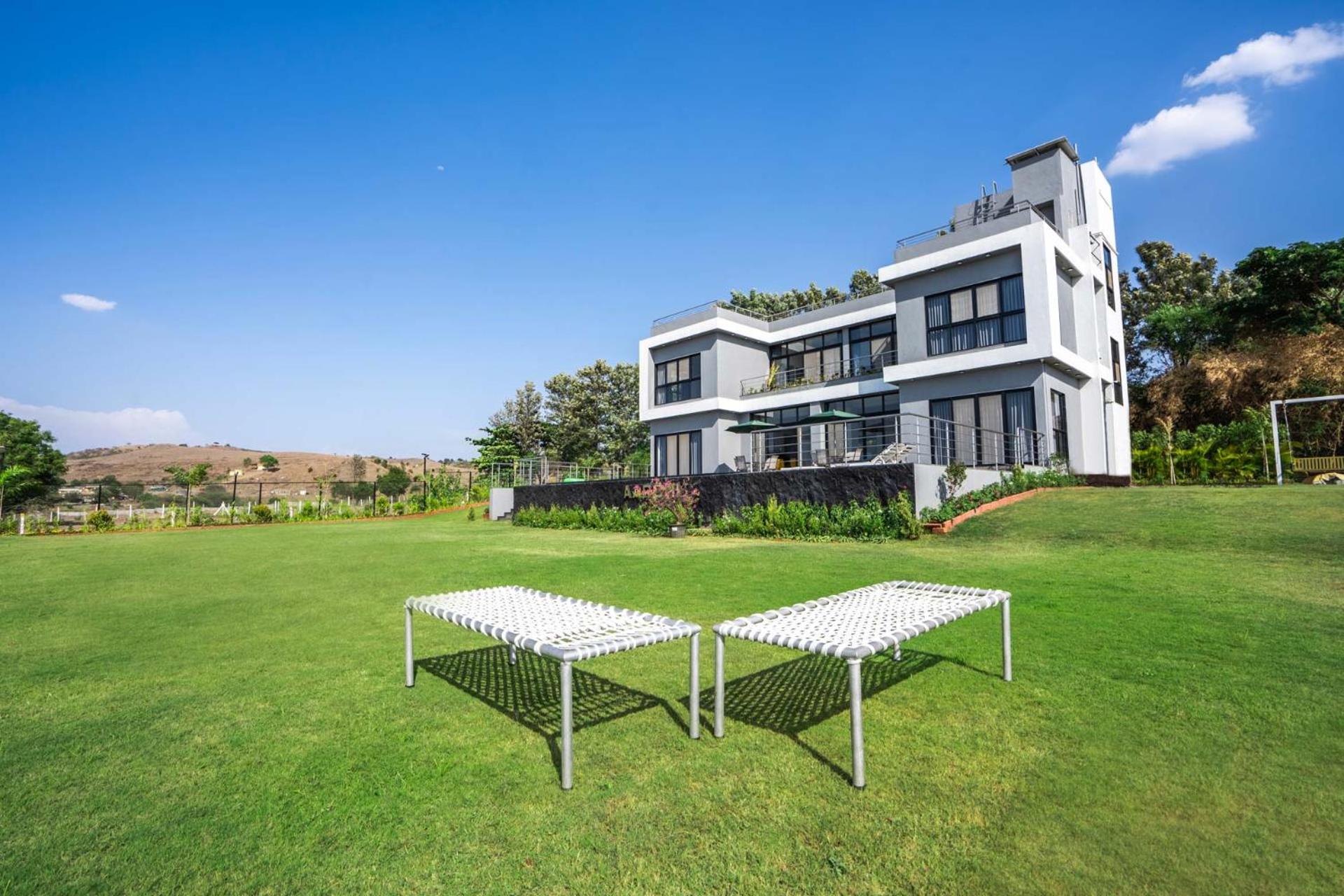 Casa Boho by StayVista - Contemporary design, Farm-view, Swimming pool & Indoor games for a chic retreat view 2