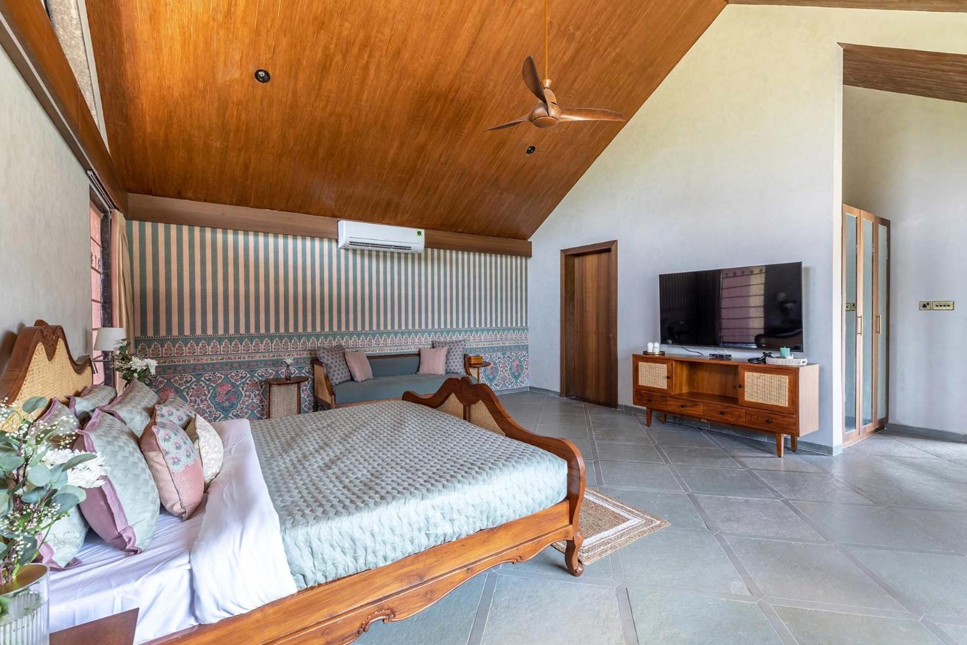 StayVista's The Barn - Mountain-View Luxury Mansion with Heated Infinity Pool, Deck, Jacuzzi, Lawn featuring a Gazebo and Firepit