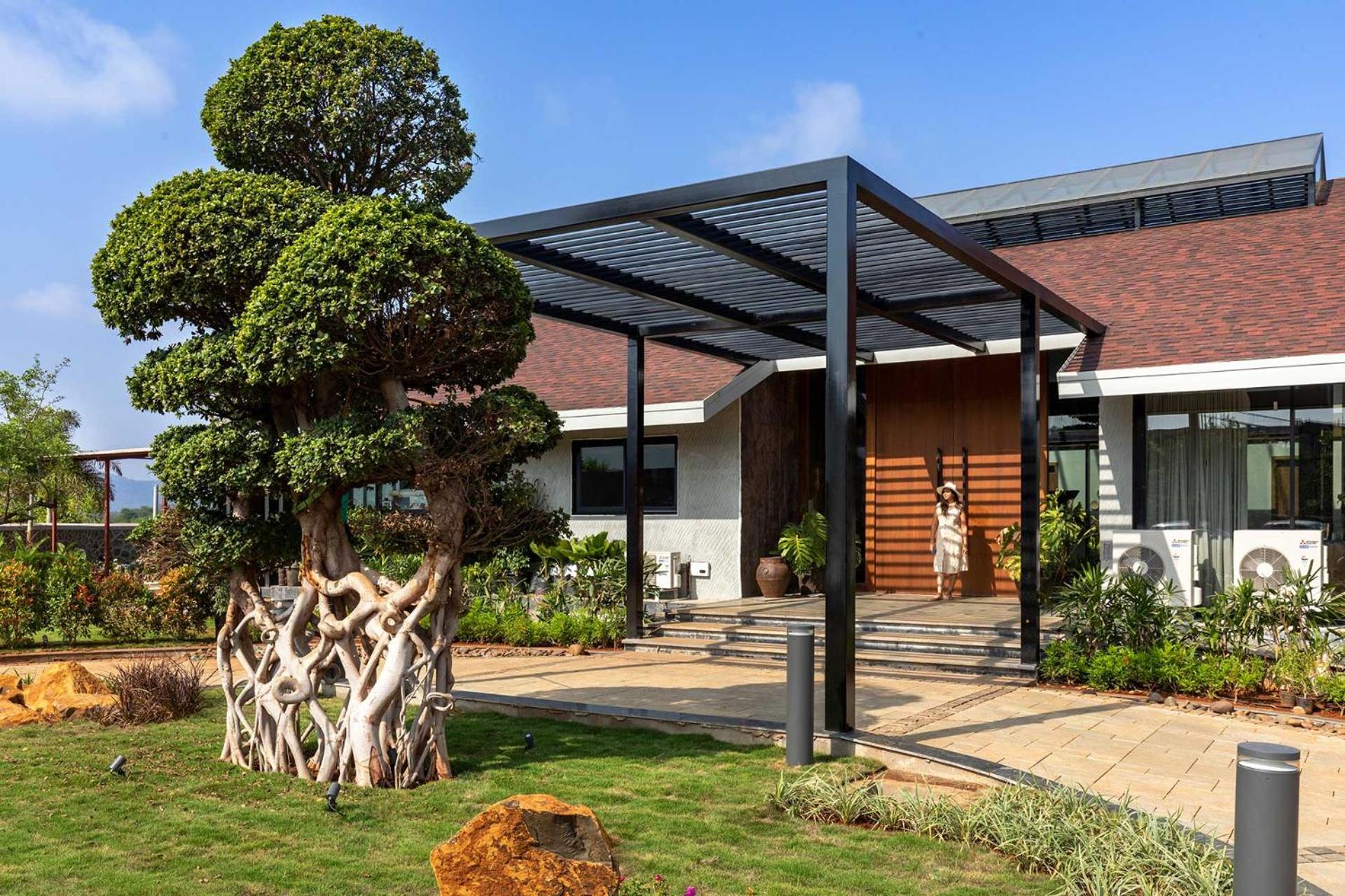 StayVista's The Barn - Mountain-View Luxury Mansion with Heated Infinity Pool, Deck, Jacuzzi, Lawn featuring a Gazebo and Firepit