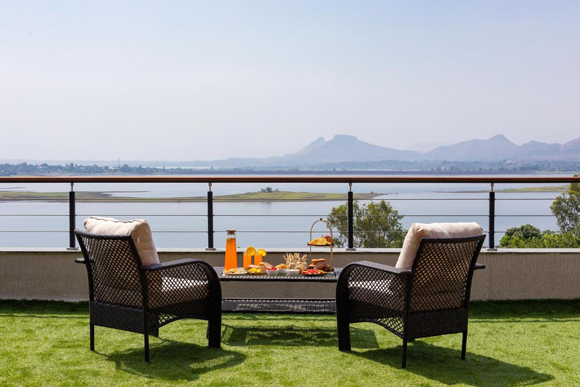 Pearl Lakeview Mansion by StayVista - Lakeside villa with Infinity pool, In-house theatre & Games room view 4
