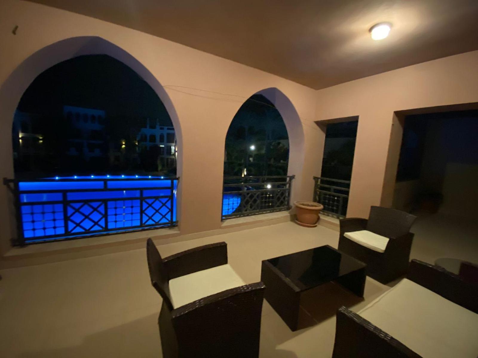 Lovely first floor tow bed rooms overviewing circular pool for families only in Talabay Aqaba view 3