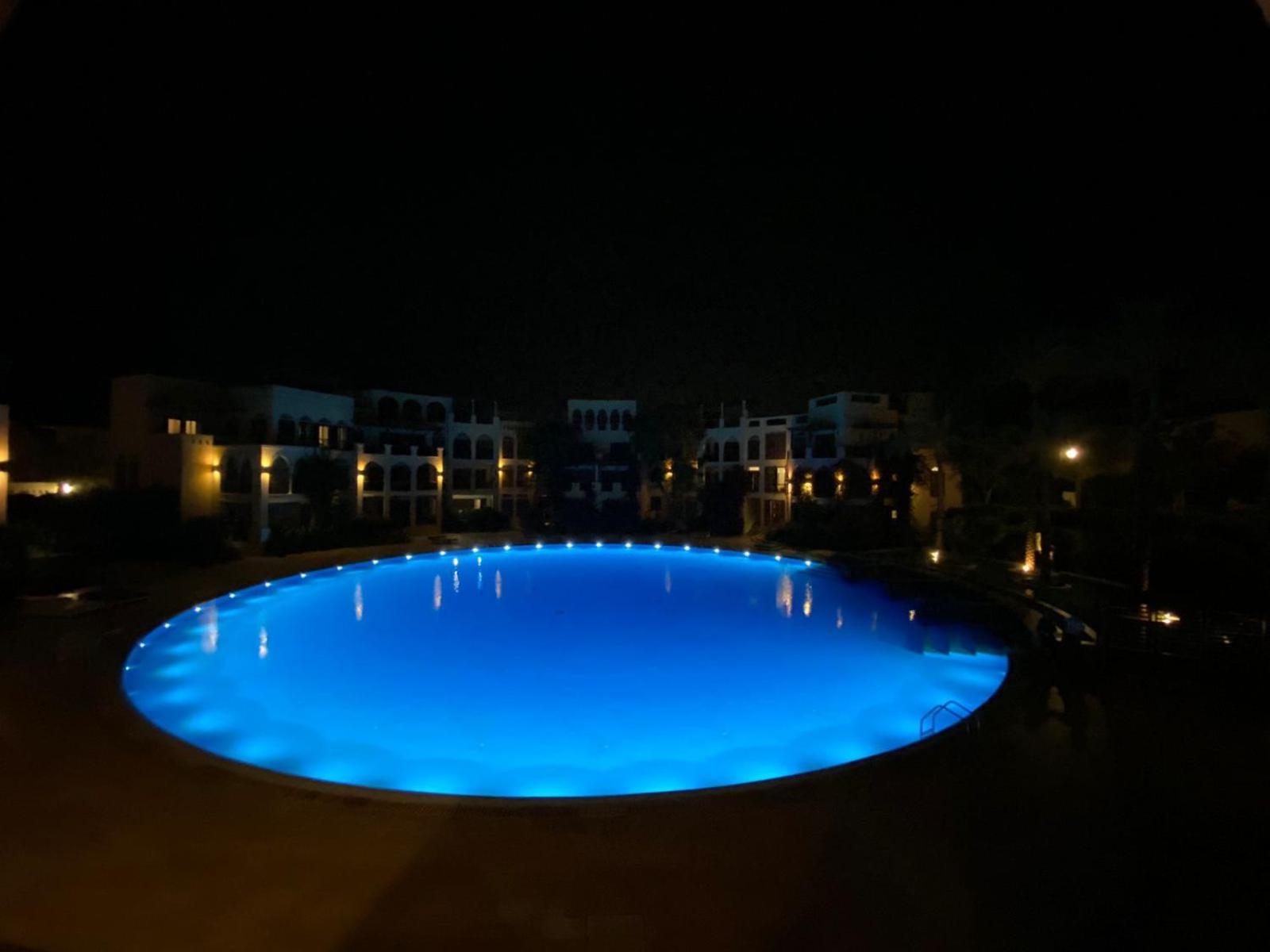 Lovely first floor tow bed rooms overviewing circular pool for families only in Talabay Aqaba view 5
