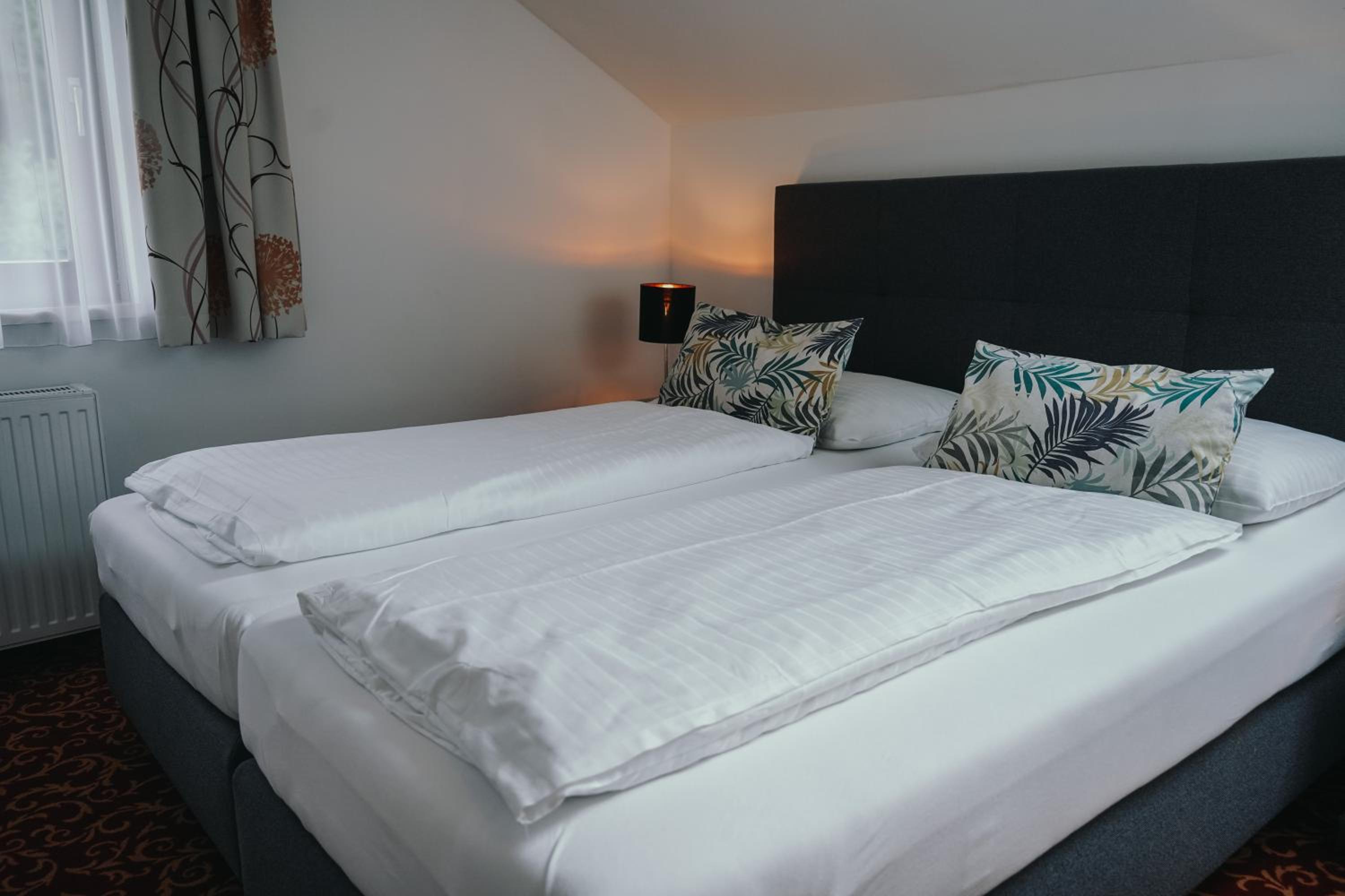 Pension Steinbichler - Apartments und Zimmer Check in 24-7