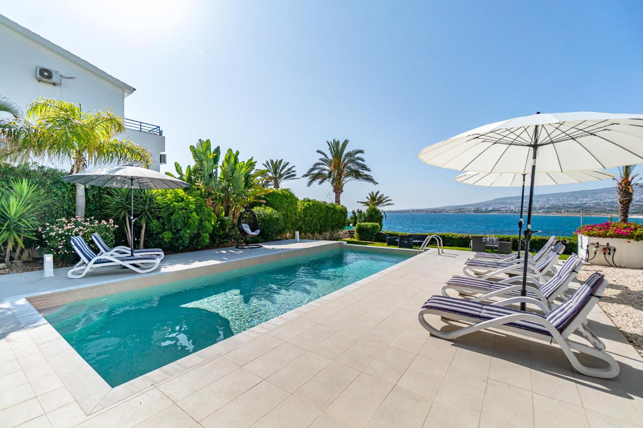 Beach Front Villa Aqua Blu by Ezoria Villas