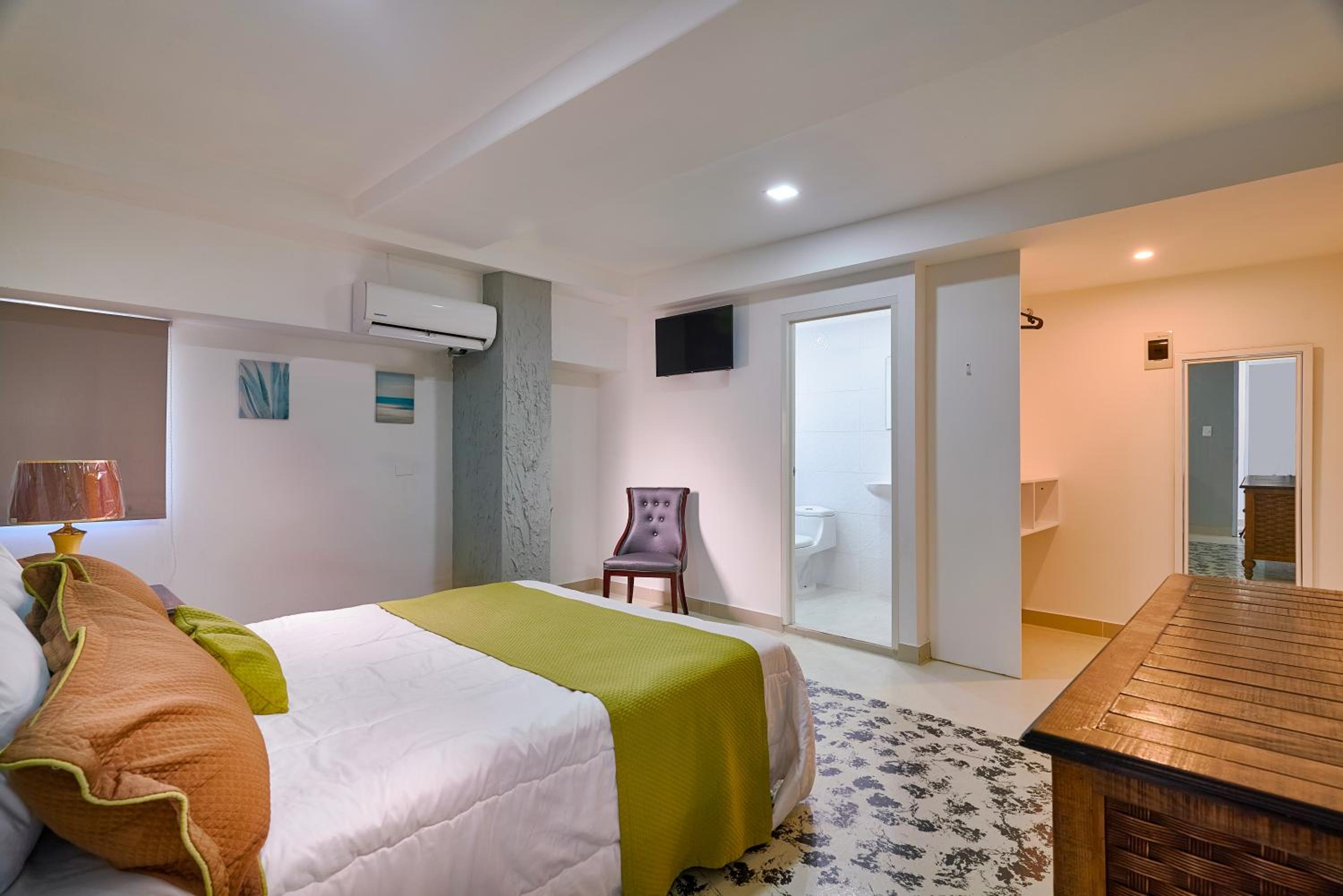 Malecon Rooms y Hotel