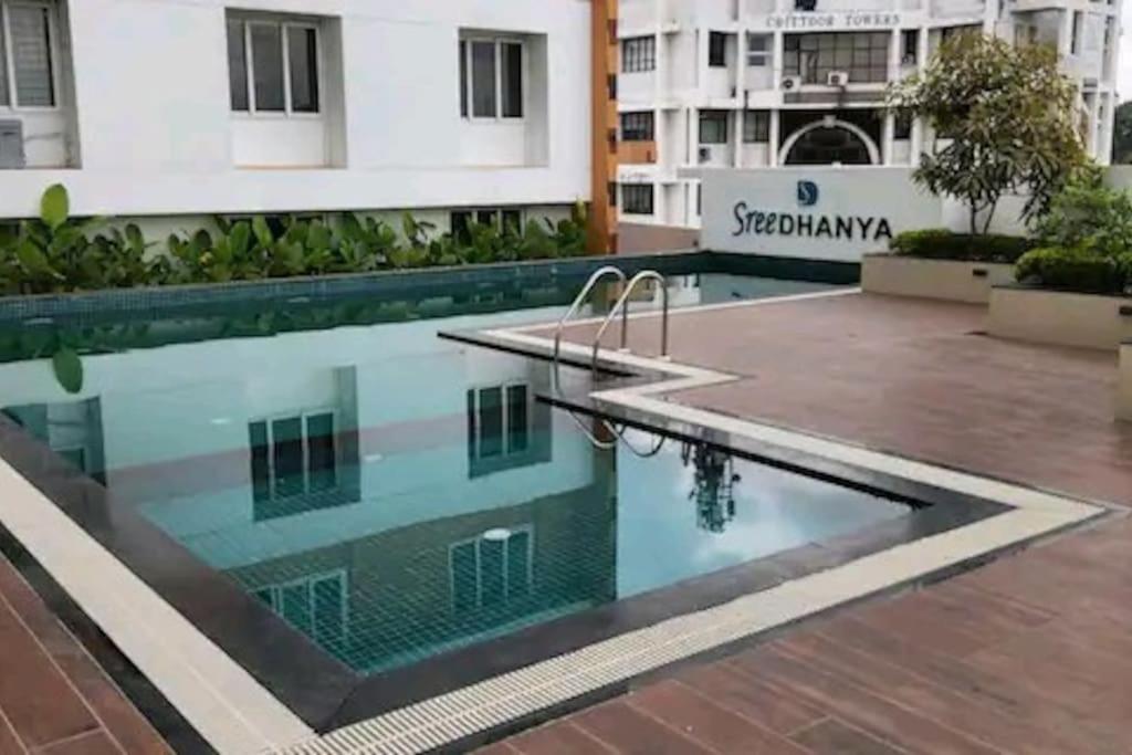 Luxurious Apartment with a pool and gym near Trivandrum railway station view 2