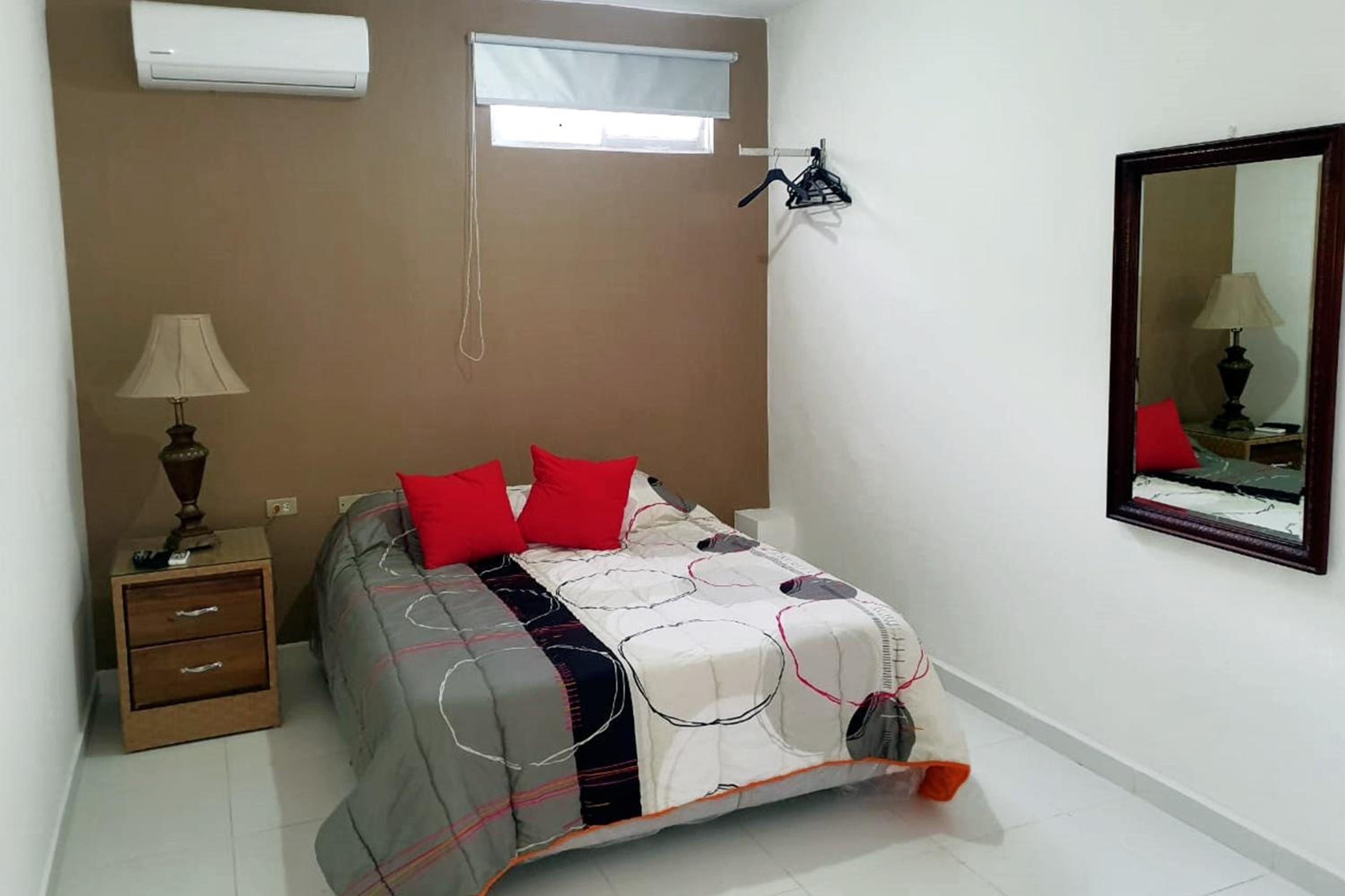 Malecon Rooms y Hotel