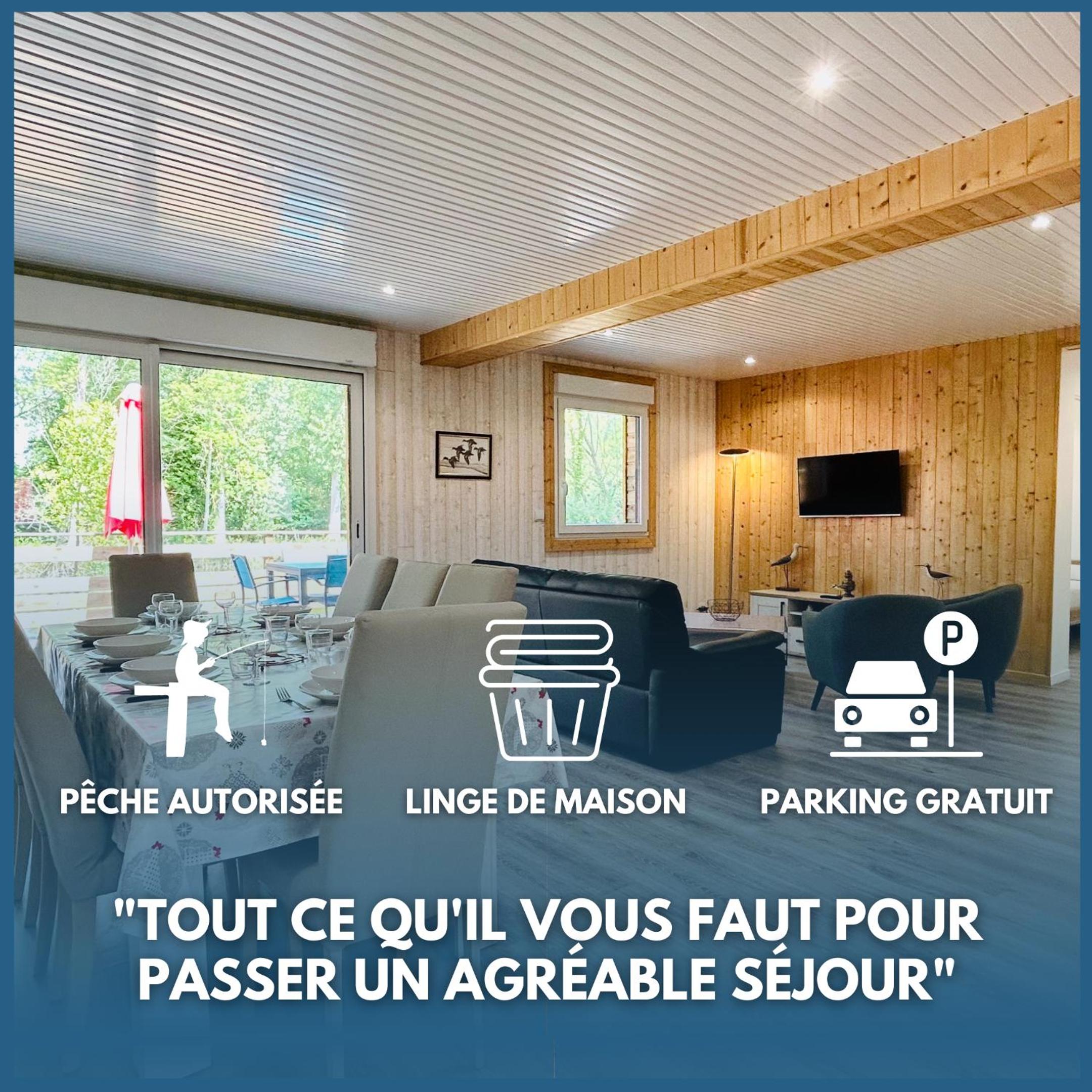 Chalet avec terrasse sur pilotis vue sur l'étang
