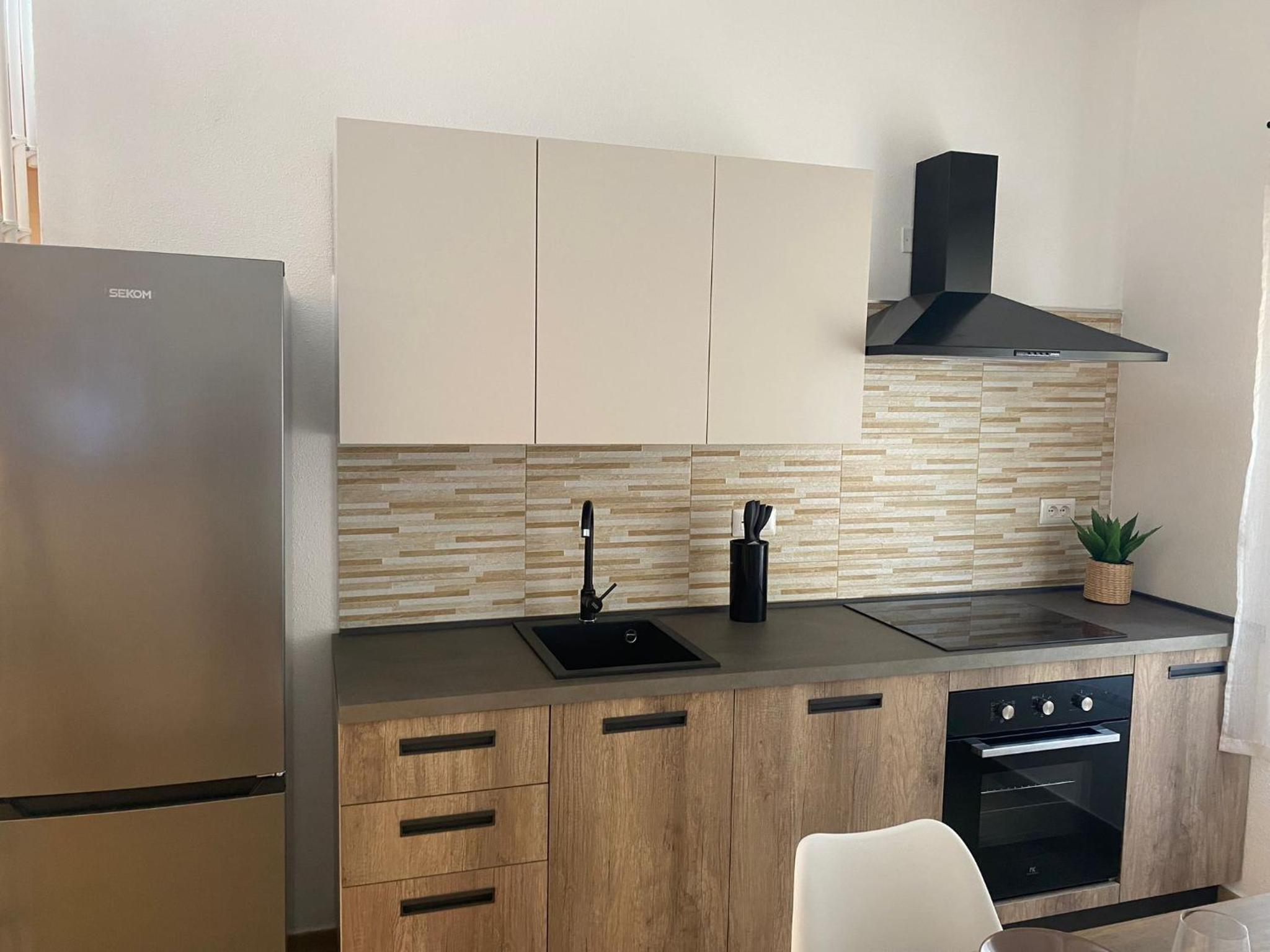 Casa del Vicolo en Alghero — kitchen