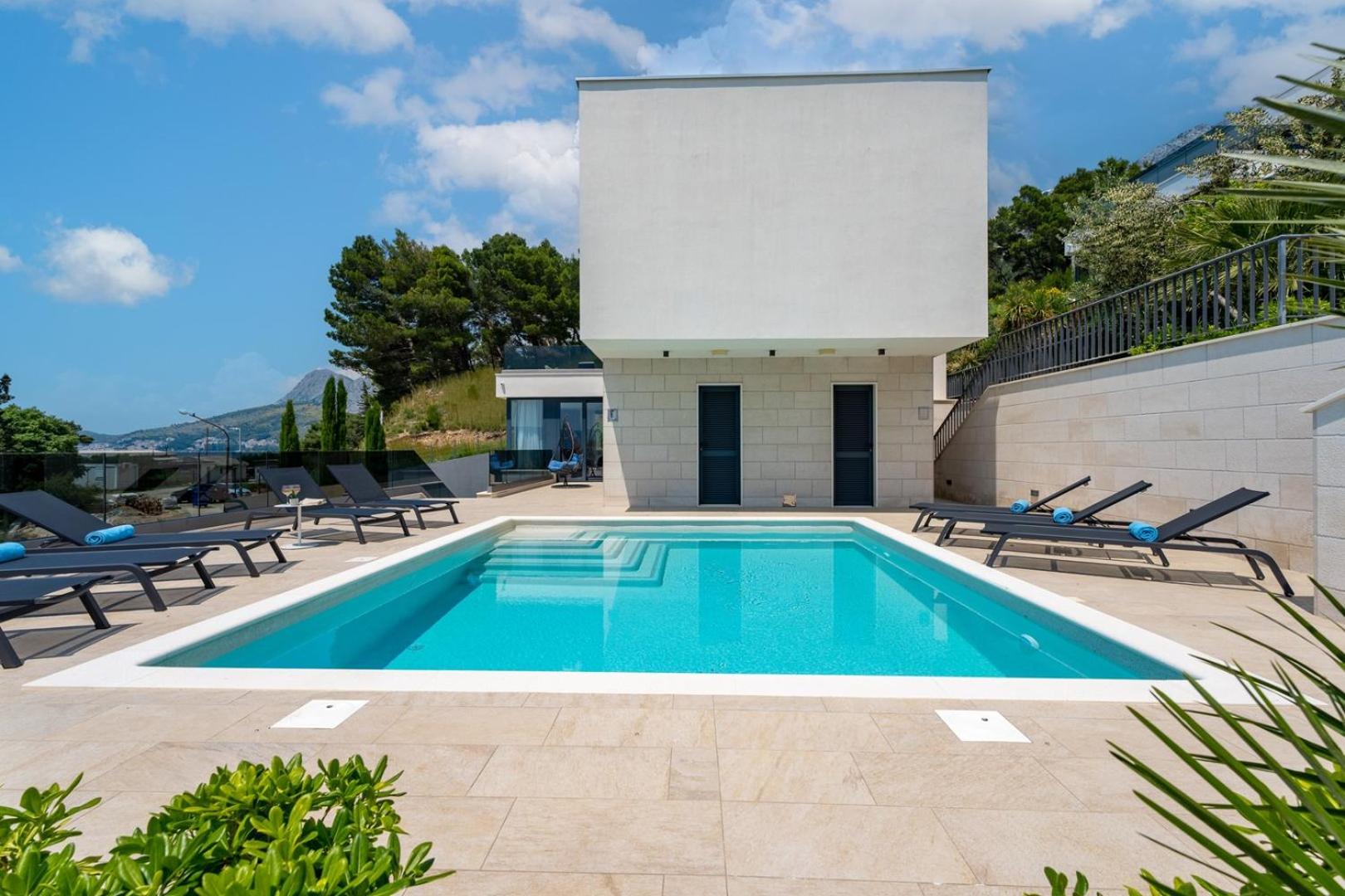 Luxury, seafront Villa Petra with heated pool only 50m from beach view 2