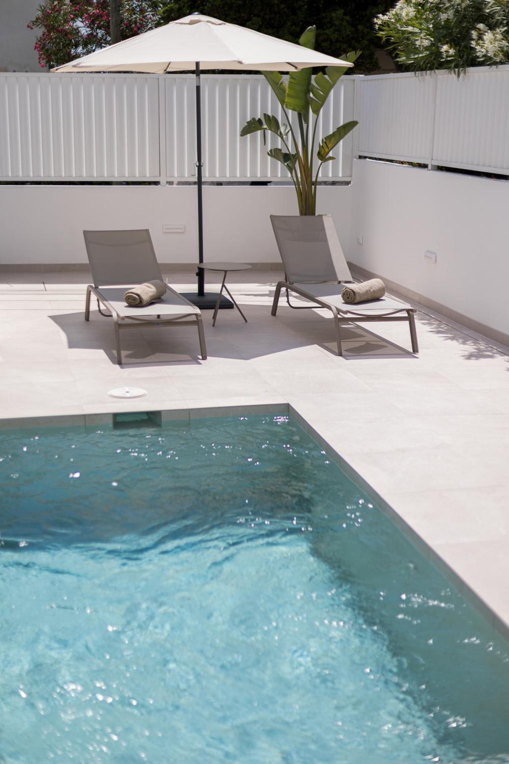 Hotel Bossa Bay Suites with Private Pool - MC Apartments Ibiza - Image 1