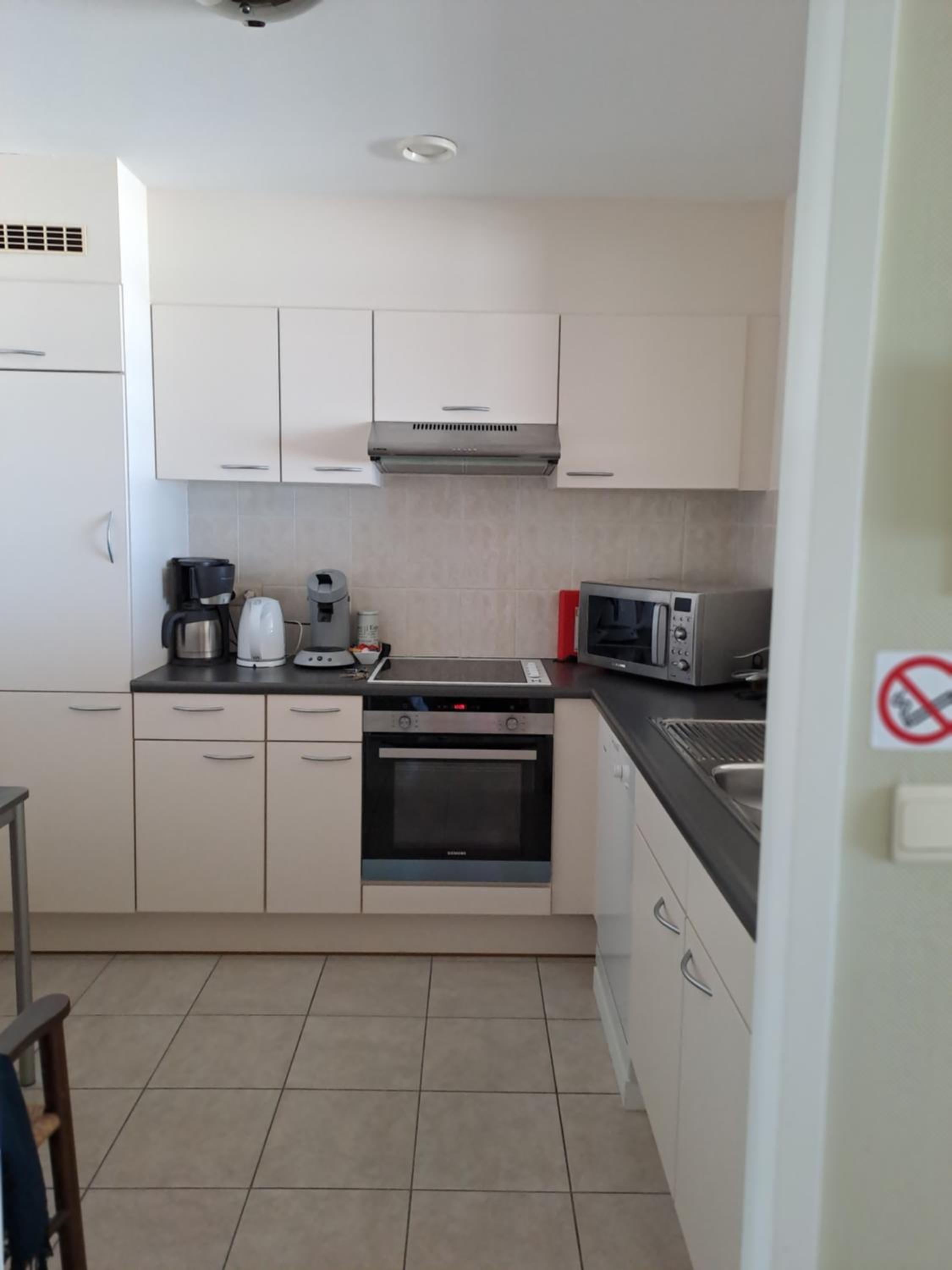 Appartement zeedijk Heist met garage