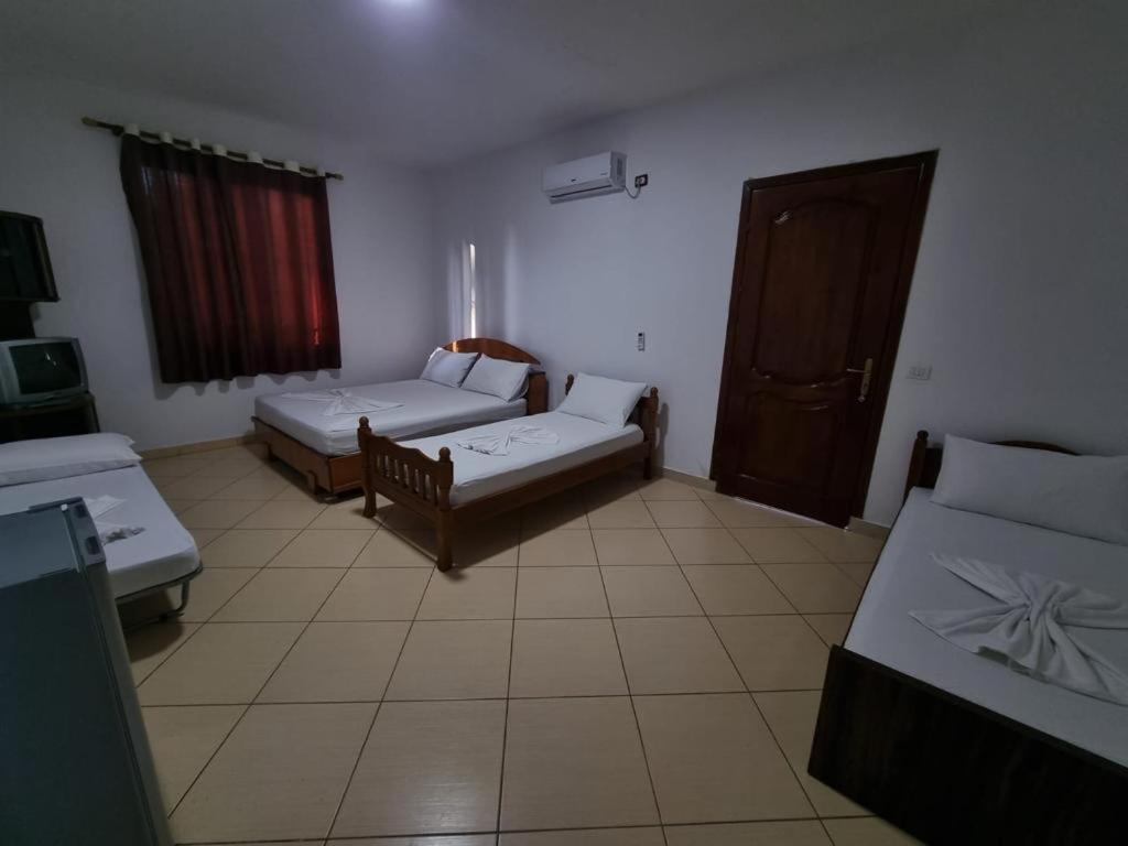 Dhoma plazhi Agimi