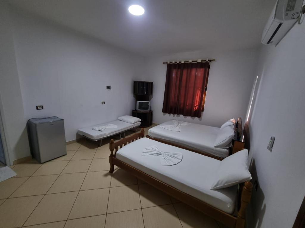 Dhoma plazhi Agimi