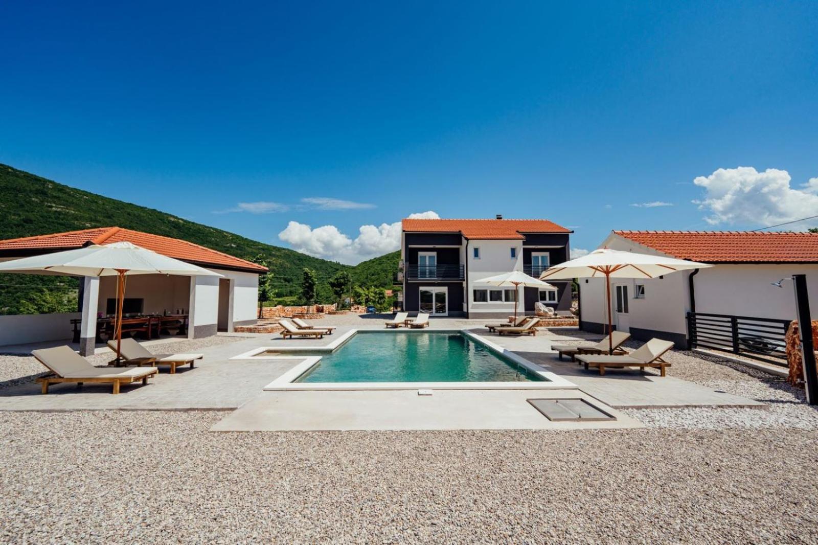 Vila Agape with a pool, football and tennis court