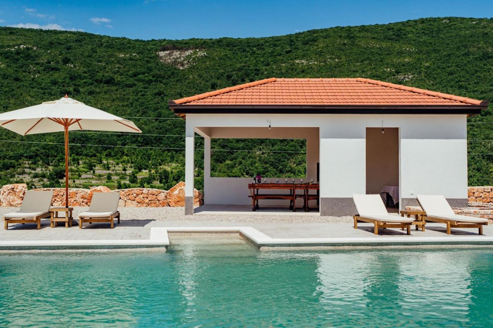 Vila Agape with a pool, football and tennis court