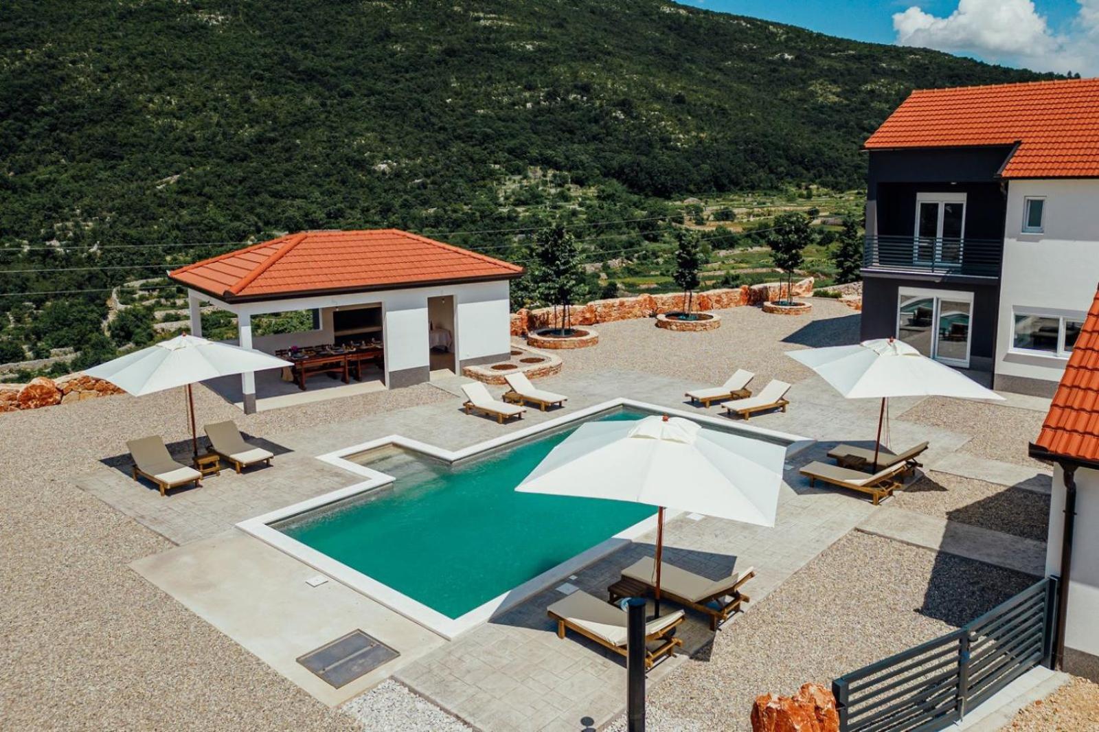 Vila Agape with a pool, football and tennis court