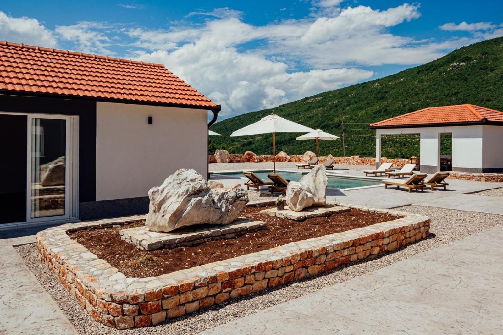 Vila Agape with a pool, football and tennis court