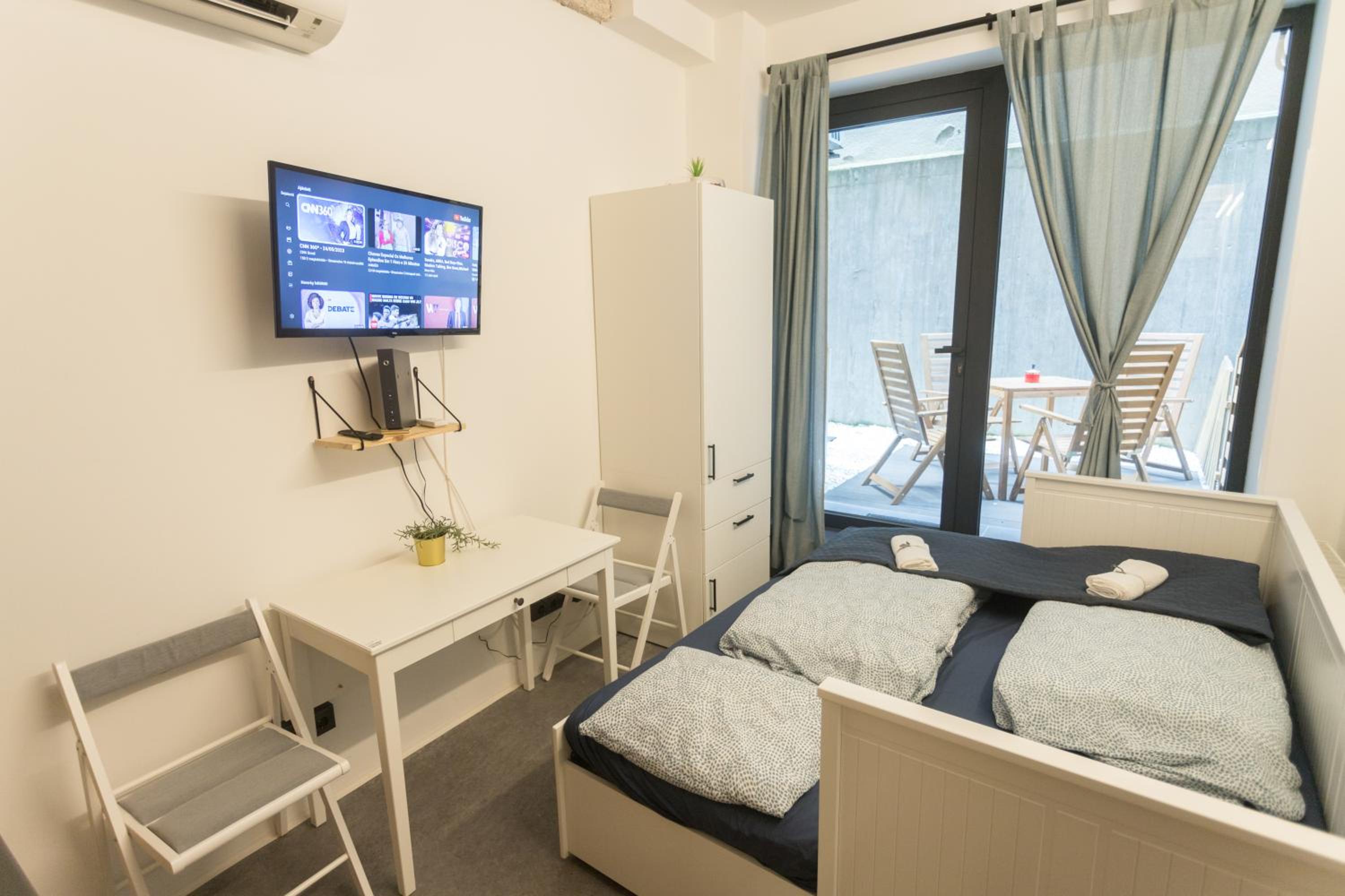 Peaceful Basement Apartment with Terrace & free GYM
