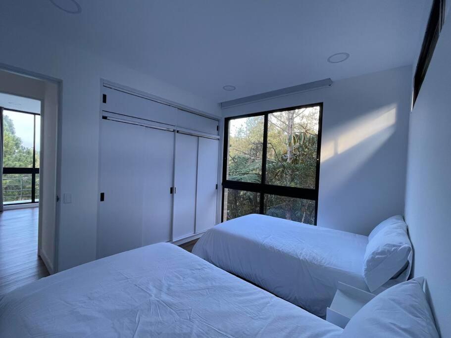 Aqua Guatapé - Lakeside Luxury Villa