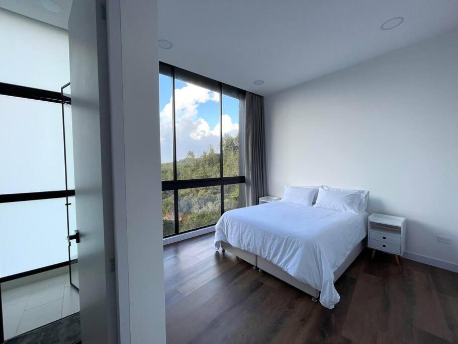Aqua Guatapé - Lakeside Luxury Villa