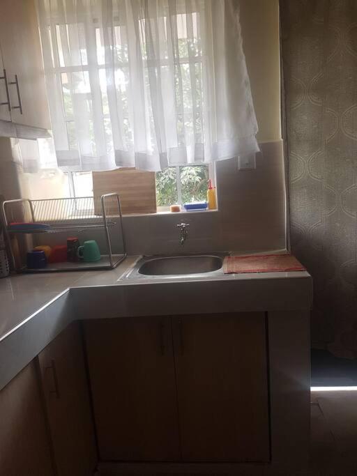 Lovely 2bedroom with free parking in the premises and Multi-purpose rooftop view 3